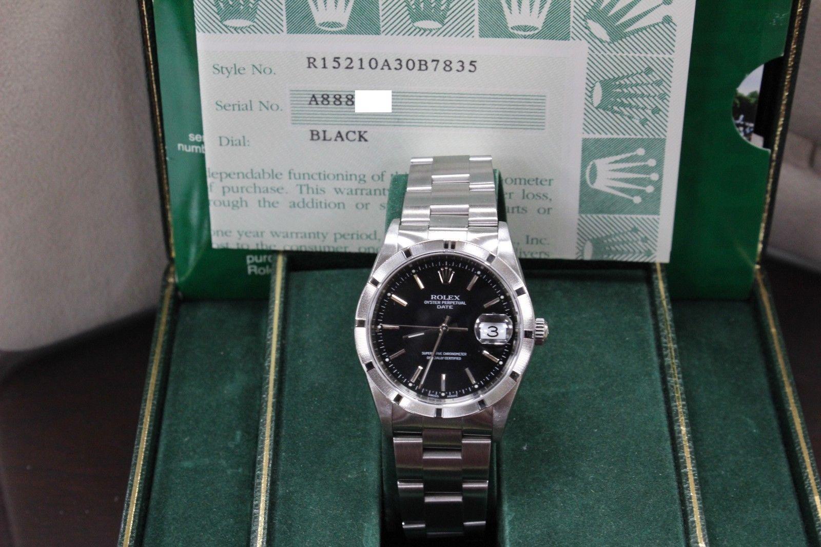 Rolex Date 15210 Stainless Steel Engine Turned Bezel Black Dial Box and Papers In Excellent Condition In San Diego, CA