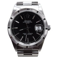 Rolex Date 15210 Stainless Steel Engine Turned Bezel Black Dial Box and Papers