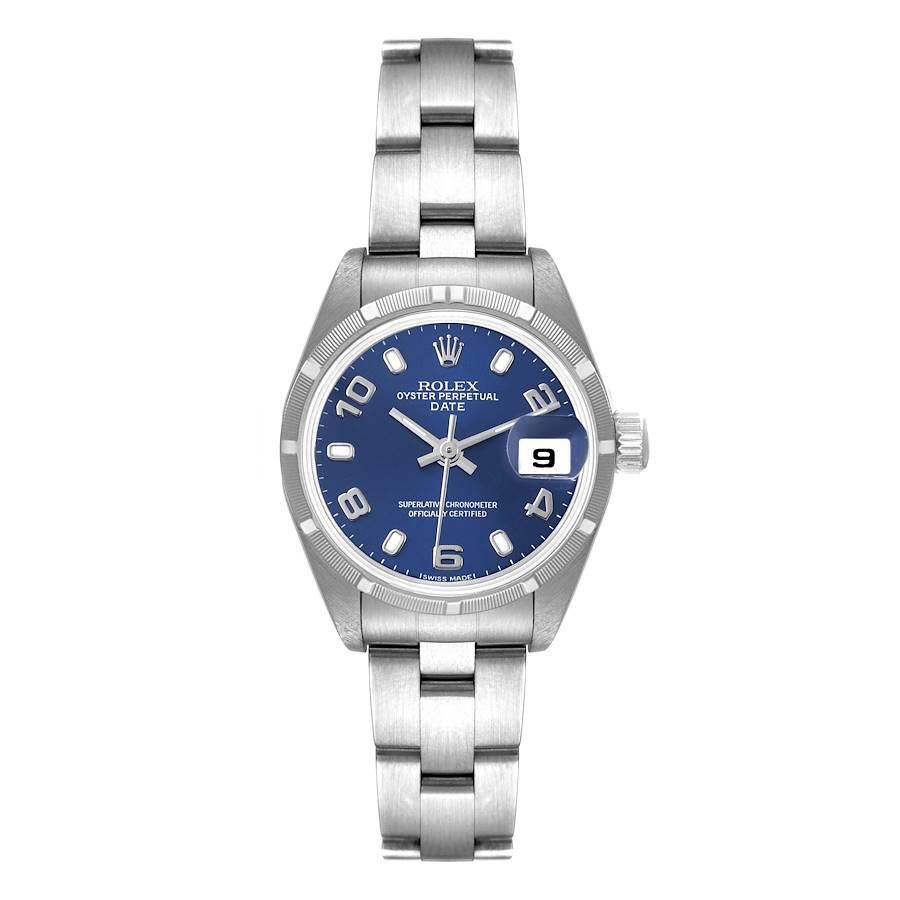 Rolex Date 26 Stainless Steel Blue Dial Ladies Watch 79190. Officially certified chronometer self-winding movement. Stainless steel oyster case 25.0 mm in diameter. Rolex logo on a crown. Stainless steel engine turned bezel. Scratch resistant