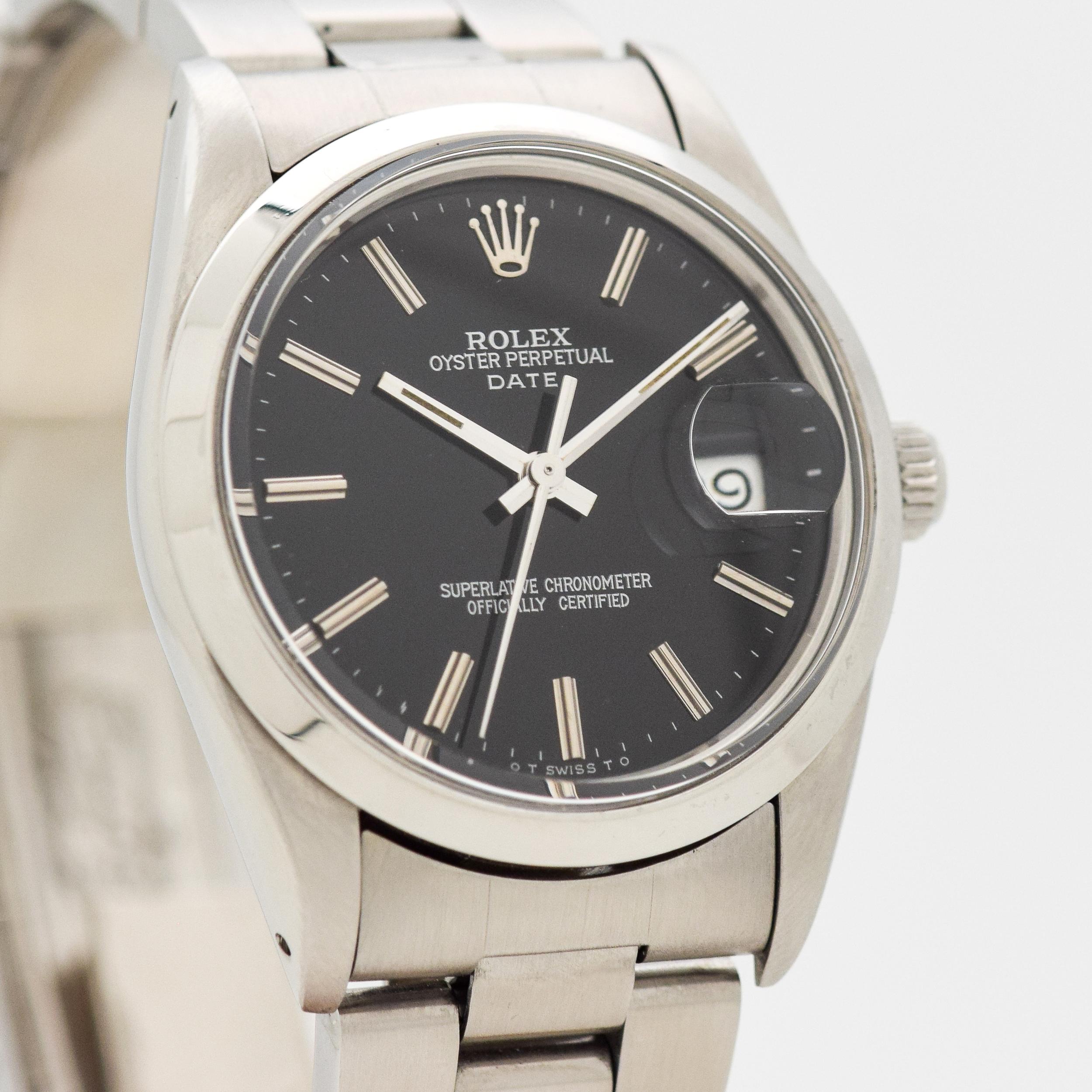 1984 Vintage Rolex Date Automatic Ref. 15000 Stainless Steel watch with Original Black Dial with Applied 14k White Gold Cylinder Stick/Bar/Baton Markers with Original Rolex Stainless Steel Oyster Bracelet. 35mm x 40mm lug to lug (1.38 in. x 1.57