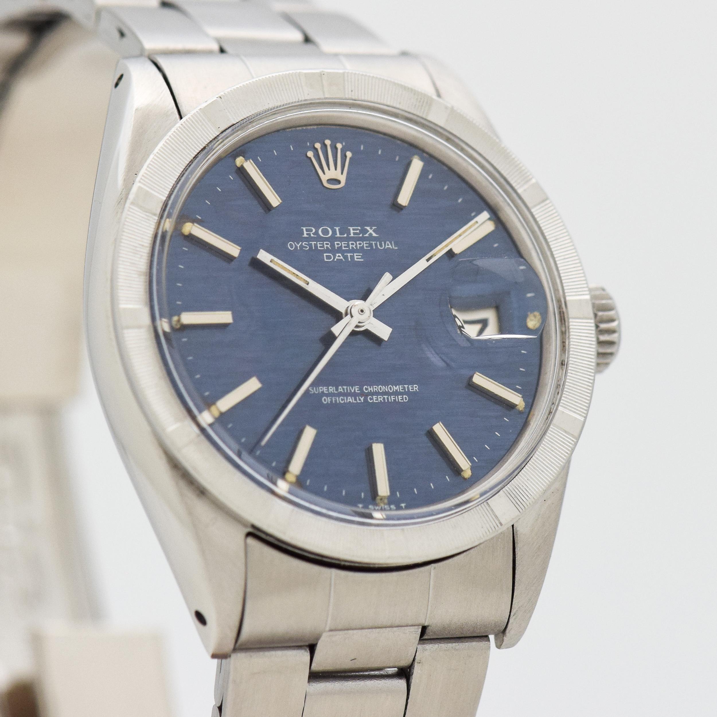 1969 Vintage Rolex Date Automatic Ref. 1501 Stainless Steel watch with Machined Bezel with Rare Original Linen Textured Blue Dial with Applied Steel Bar/Baton Markers with Black Inlay with Original Rolex Stainless Steel Oyster Bracelet. 35mm x 41mm