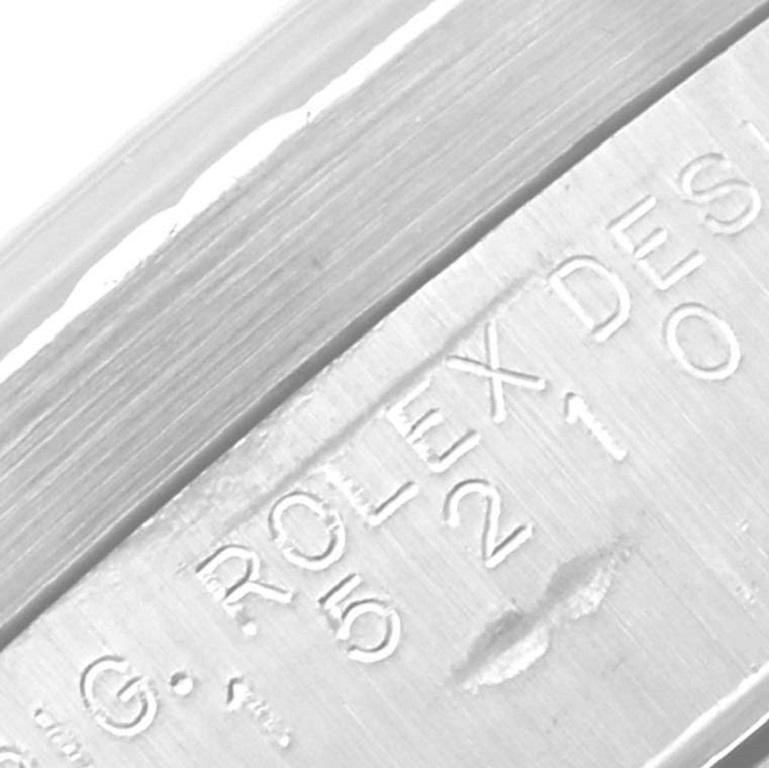 Rolex Date Black Dial Engine Turned Bezel Steel Mens Watch 15210 Box Papers. Mouvement automatique à remontage automatique, officiellement certifié chronomètre. Boîtier oyster en acier inoxydable de 34 mm de diamètre. Logo Rolex sur la couronne.