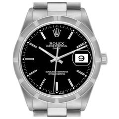 Rolex Montre pour homme Date à cadran noir et lunette tournée en acier 15210