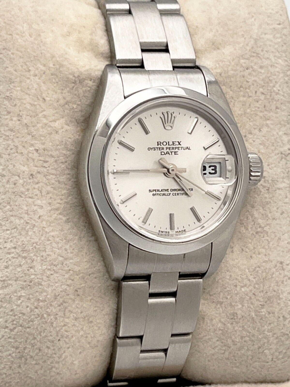 Rolex Date Ladies 69160 Silver Dial Stainless Steel Box Papers In Excellent Condition For Sale In San Diego, CA
