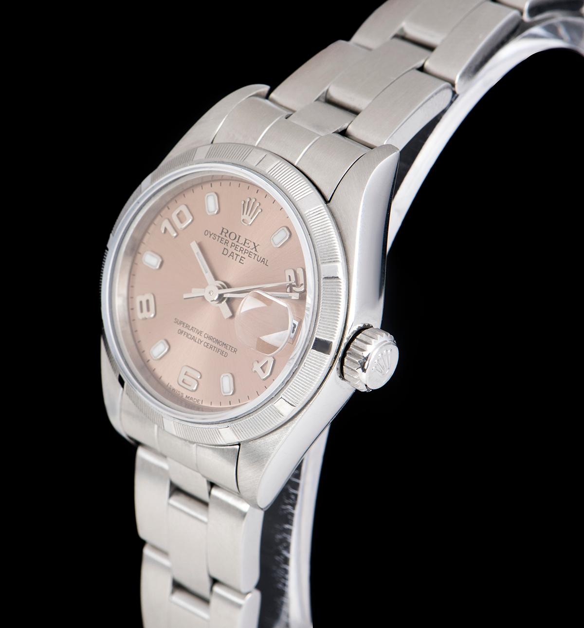A Stainless Steel Oyster Perpetual Date Ladies Wristwatch, pink dial with applied hour markers and applied arabic numbers 2, 4, 6, 8 and 10, date at 3 0'clock, a fixed stainless steel engine turned bezel, a stainless steel oyster bracelet with a