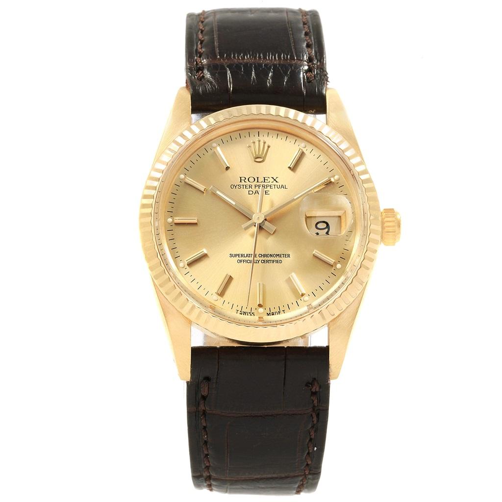Rolex Date Mens 14k Yellow Gold Vintage Mens Watch 15037. Officially certified chronometer automatic self-winding movement. 14k yellow gold case 34.0 mm in diameter. Rolex logo on a crown. 14k yellow gold fluted bezel. Acrylic crystal with cyclops