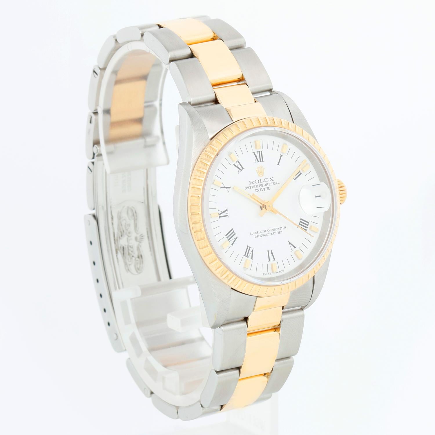 Rolex Date Men's 2-Tone Steel & Gold Watch 15223 - Automatic winding, 31 jewels, Quickset, sapphire crystal. Stainless steel case with 18k yellow gold fluted  bezel (34mm diameter). White dial with black Roman numerals. Stainless steel and 18k