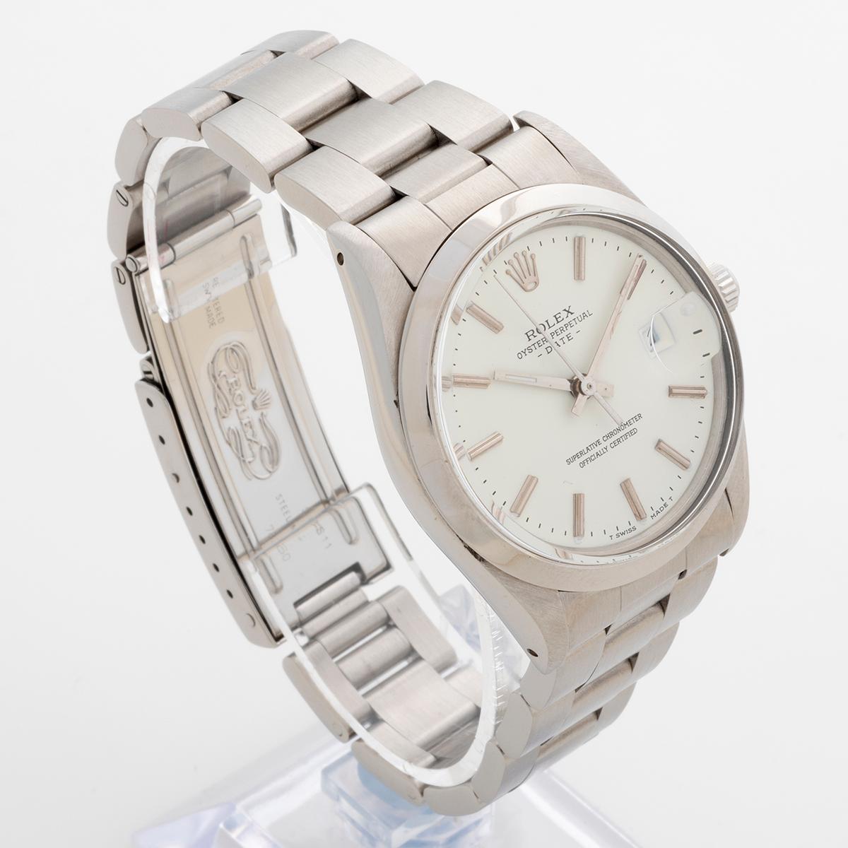 Our vintage Rolex Date features a stainless steel 34mm case with stainless steel Oyster bracelet. Notably, this reference 15000 has a lovely crisp white baton dial. We date production to c.1982 as it bears a 78 **** serial. The overall condition of