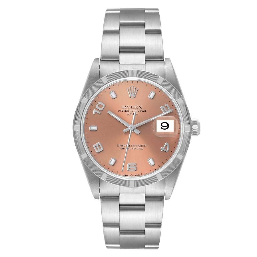 Rolex Date Salmon Dial Engine Turned Bezel Steel Mens Watch 15210. Officially certified chronometer automatic self-winding movement with quickset date function. Stainless steel oyster case 34.0 mm in diameter. Rolex logo on the crown. Stainless