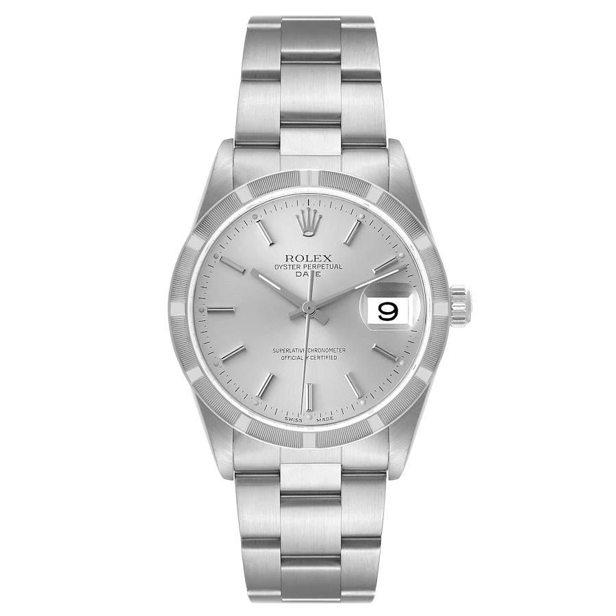 Rolex Date Silver Dial Engine Turned Bezel Steel Mens Watch 15210. Officially certified chronometer automatic self-winding movement with quickset date. Stainless steel case 34.0 mm in diameter. Rolex logo on the crown. Stainless steel engine turned