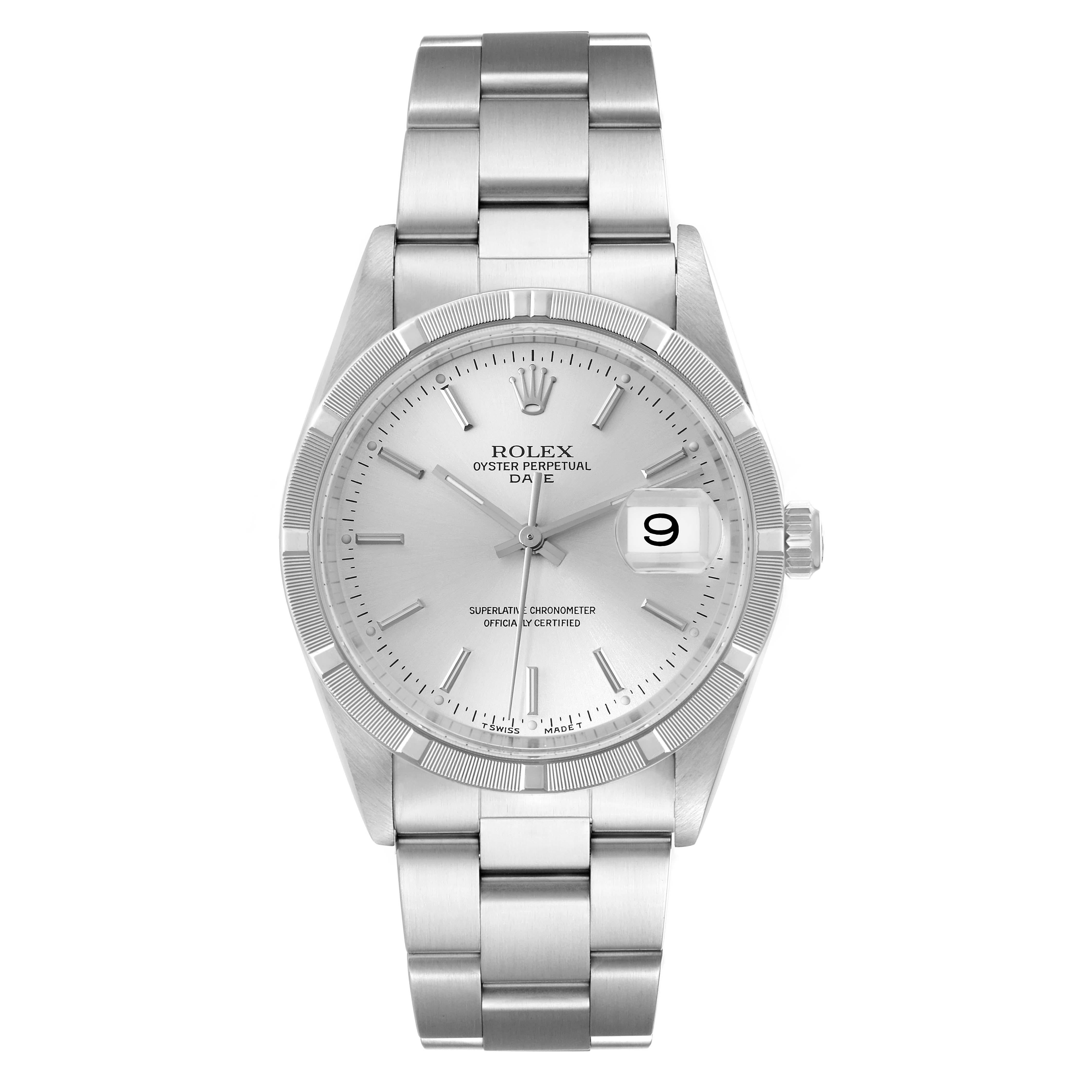 Rolex Date Silver Dial Engine Turned Bezel Steel Mens Watch 15210. Officially certified chronometer automatic self-winding movement with quickset date. Stainless steel case 34.0 mm in diameter. Rolex logo on the crown. Stainless steel engine turned