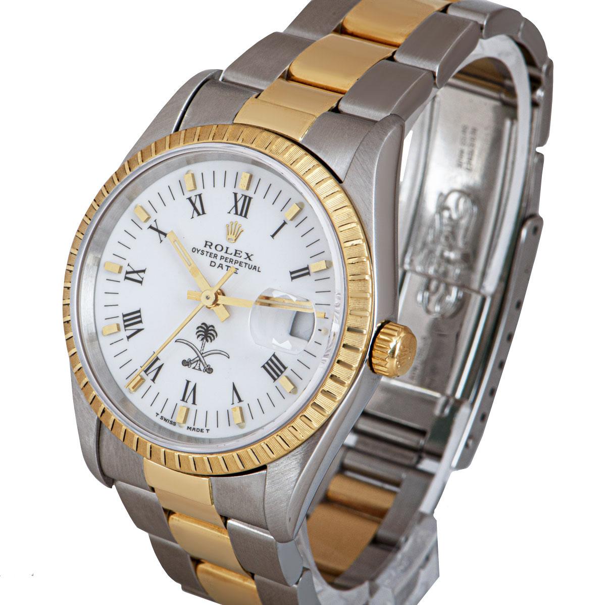 A 34 mm Stainless Steel and 18k Yellow Gold Oyster Perpetual Date Gents Wristwatch, white dial with roman numerals and applied hour markers, date at 3 0'clock, rare emblem of Saudi Arabia at 6 0'clock, a fixed 18k yellow gold engine turned bezel, a