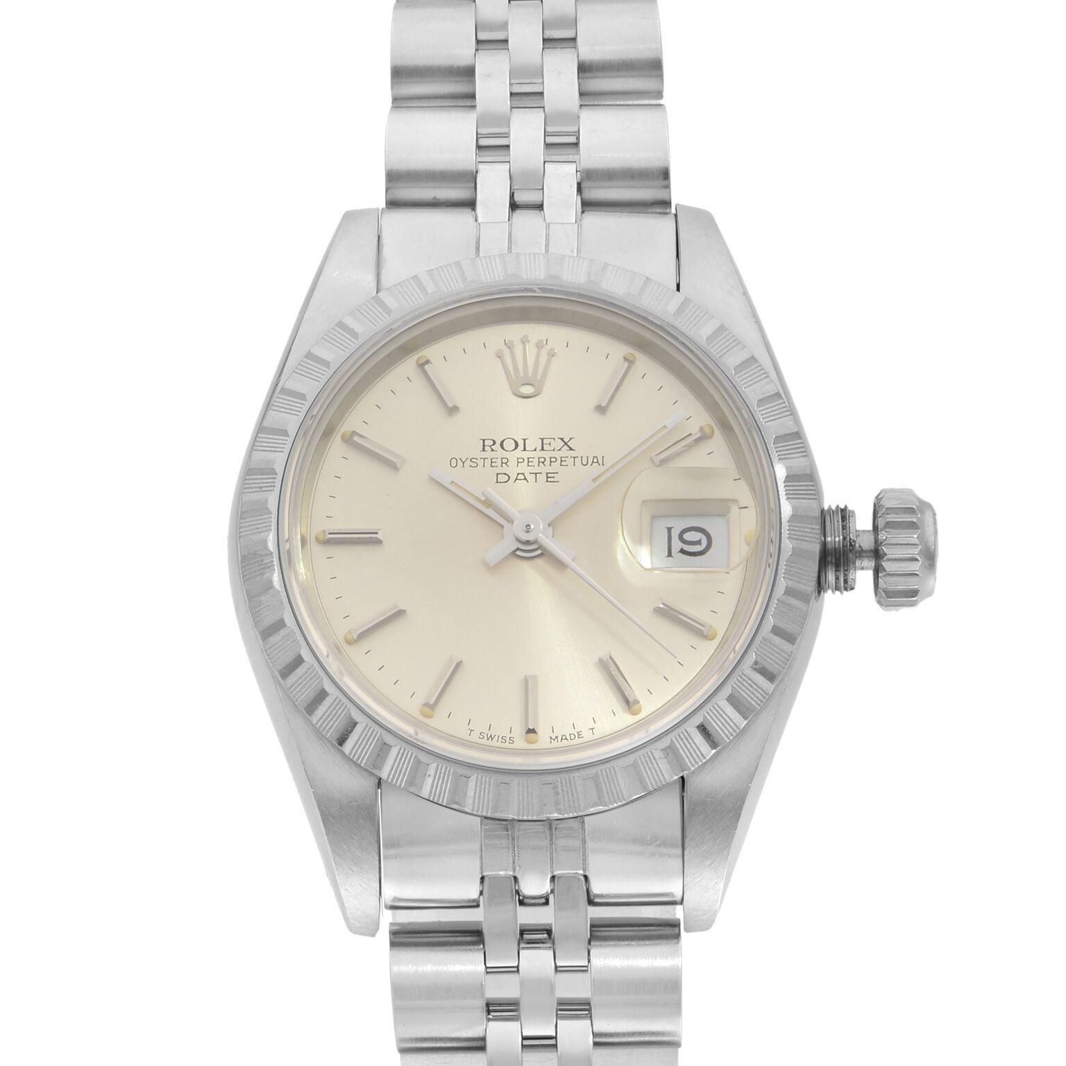 This pre-owned Rolex Date 69240 is a beautiful Ladie's timepiece that is powered by mechanical (automatic) movement which is cased in a stainless steel case. It has a round shape face, date indicator dial and has hand sticks style markers. It is