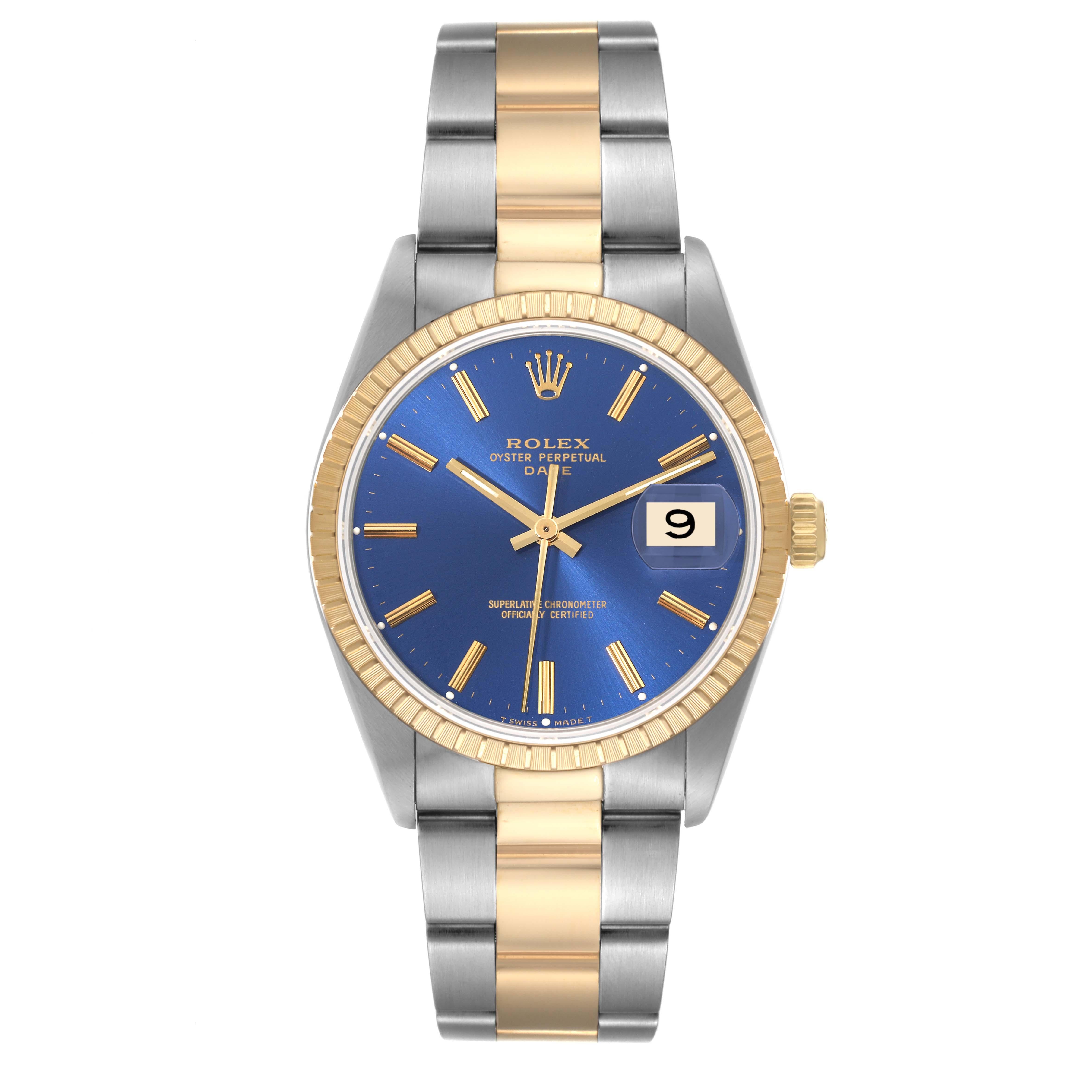 Rolex Date Steel Yellow Gold Blue Dial Mens Watch 15223. Officially certified chronometer automatic self-winding movement. Stainless steel and 18K yellow gold oyster case 34.0 mm in diameter. Rolex logo on the crown. 18K yellow gold engine turned