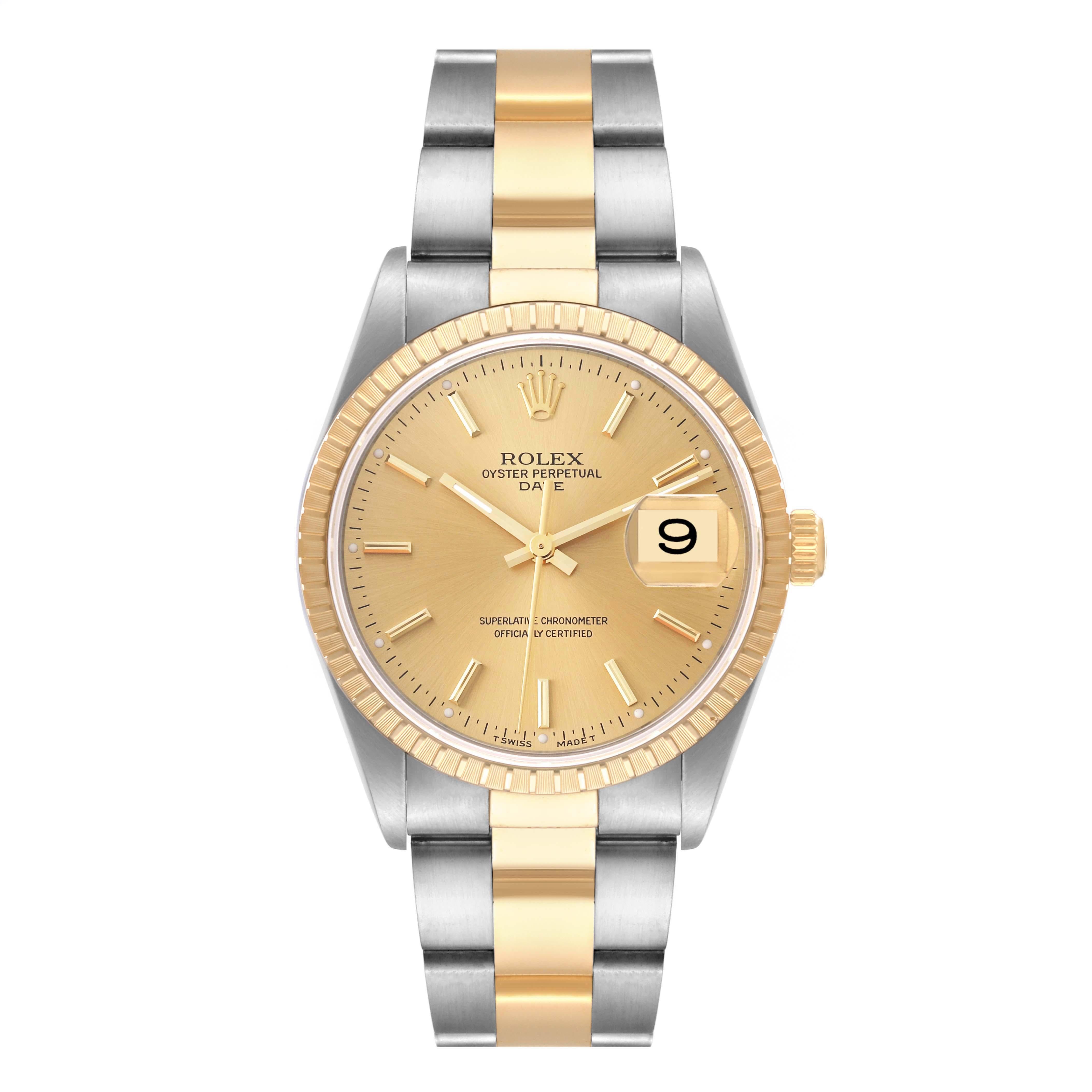 Rolex Date Steel Yellow Gold Engine Turned Bezel Mens Watch 15223 Box Papers. Officially certified chronometer automatic self-winding movement. Stainless steel and 18K yellow gold oyster case 34.0 mm in diameter. Rolex logo on the crown. 18K yellow