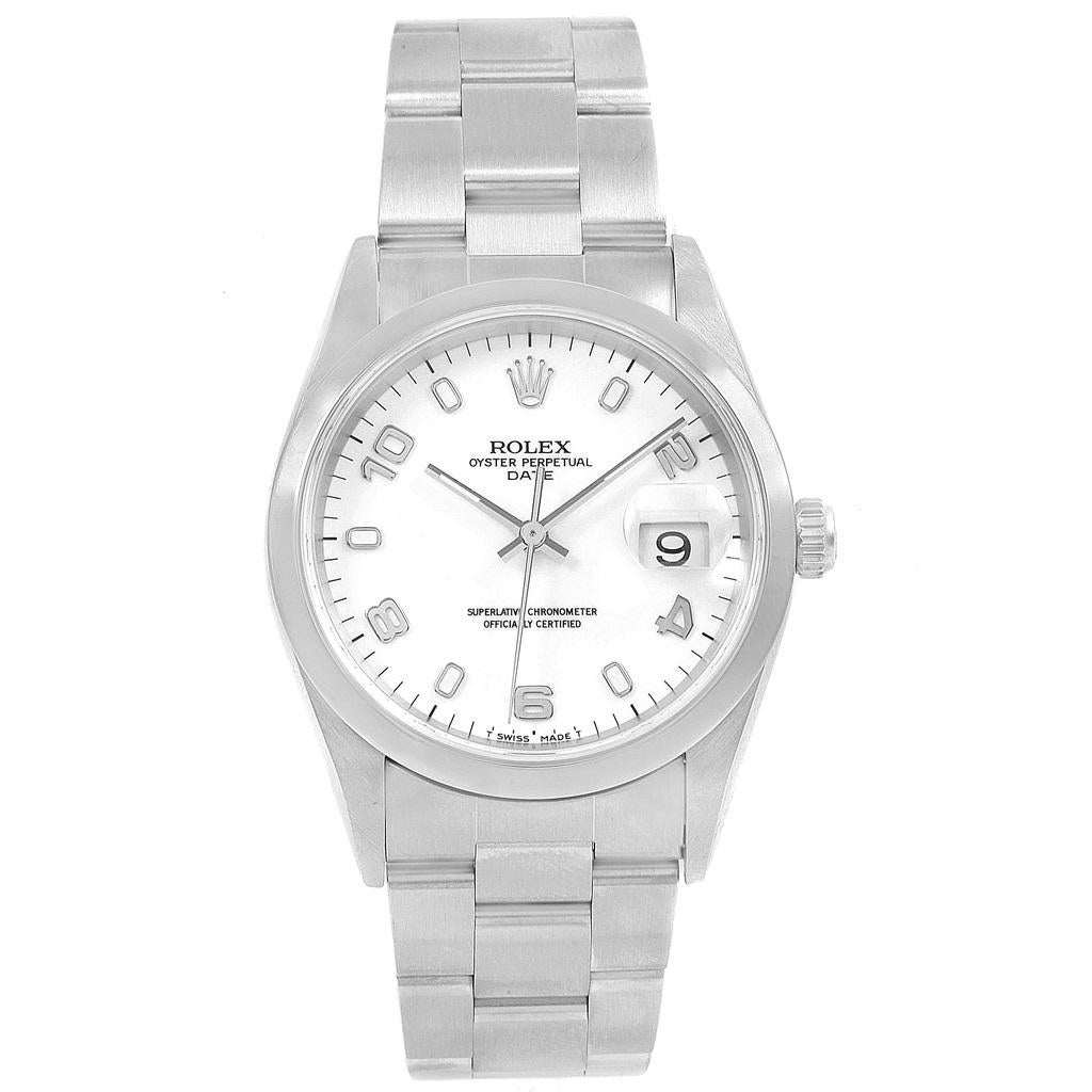 Rolex Date White Arabic Dial Smooth Bezel Steel Mens Watch 15200 Box. Officially certified chronometer self-winding movement. Stainless steel oyster case 34.0 mm in diameter. Rolex logo on a crown. Stainless steel smooth domed bezel. Scratch