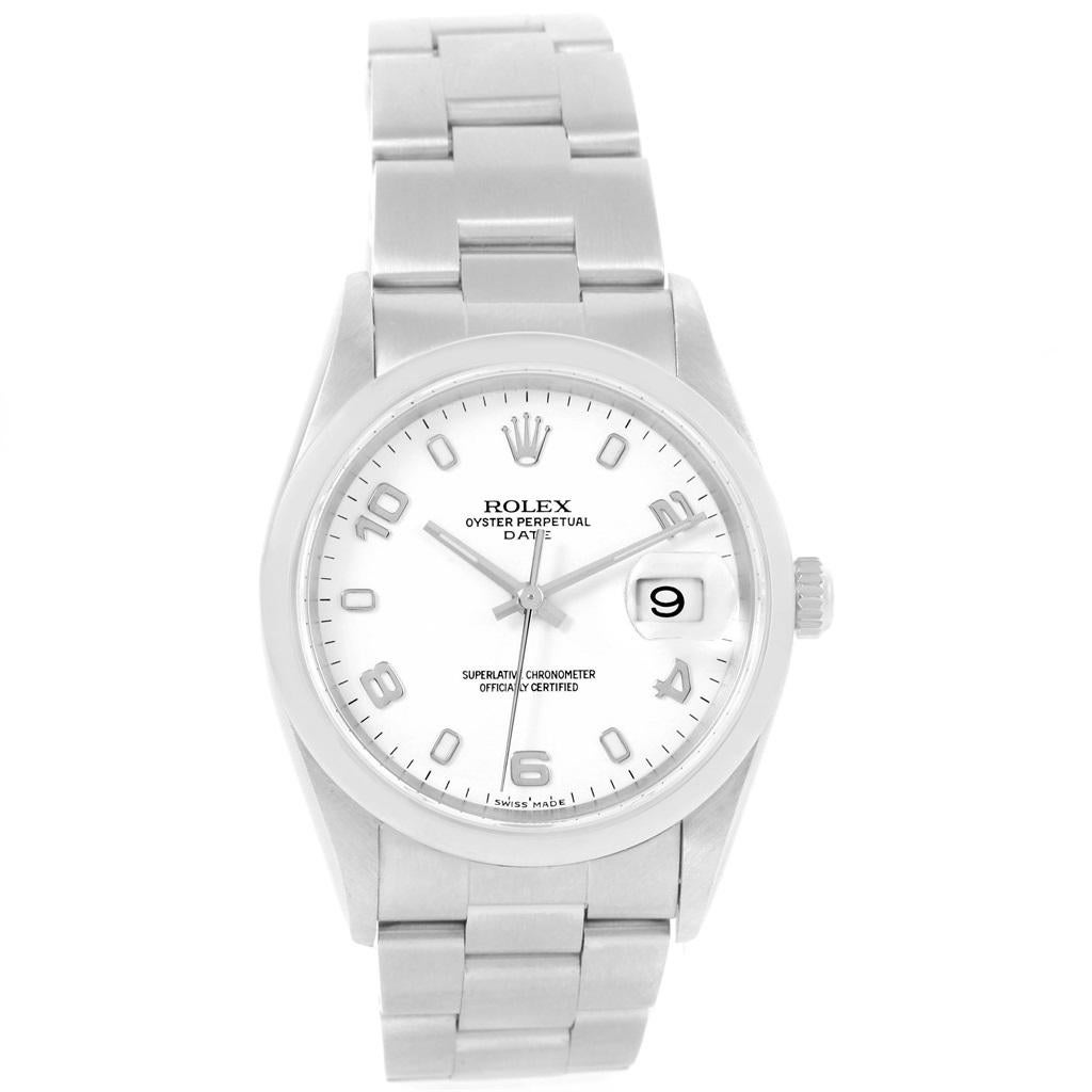 Rolex Date White Arabic Dial Steel Mens Watch 15200 Box. Officially certified chronometer self-winding movement. Stainless steel oyster case 34.0 mm in diameter. Rolex logo on a crown. Stainless steel smooth domed bezel. Scratch resistant sapphire