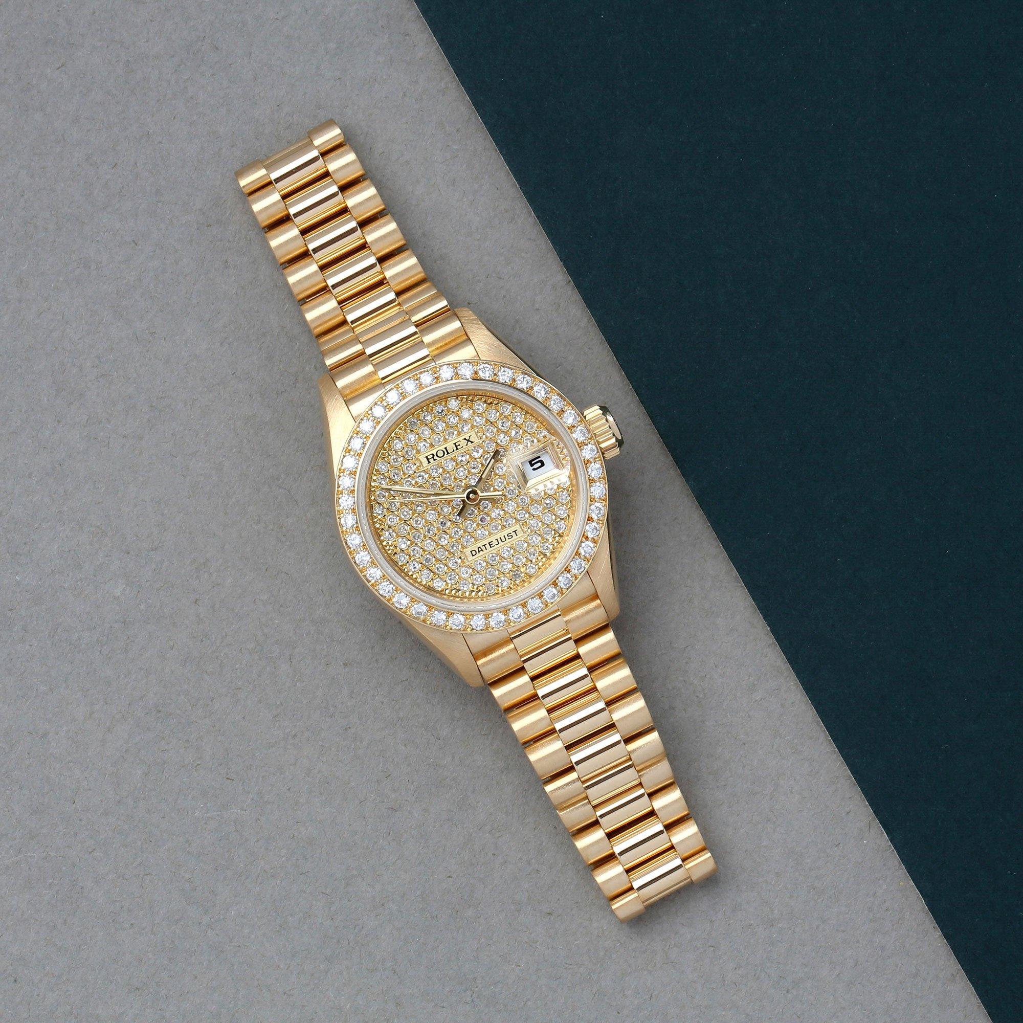 Xupes Reference: COM002655
Manufacturer: Rolex
Model: Datejust
Model Variant: 0
Model Number: 69178
Age: 1998
Gender: Ladies
Complete With: Rolex Service Pouch & Guarantee  
Dial: Gold Pave Diamond
Glass: Sapphire Crystal
Case Material: Yellow