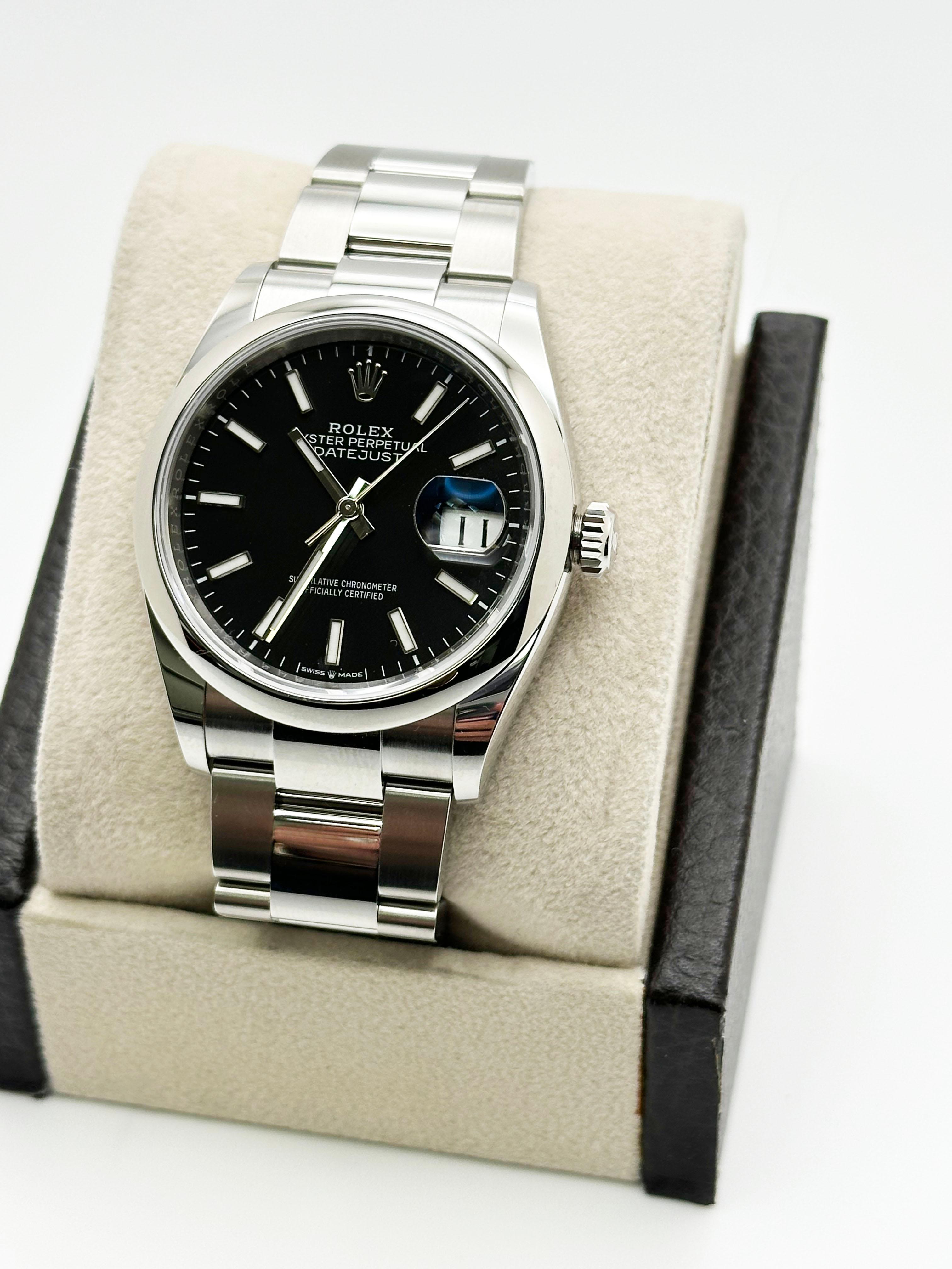Style Number: 126200



Serial: 8K477***



Year: 2021

 

Model: Rolex Datejust 

 

Case Material: Stainless Steel 

 

Band: Stainless Steel 

  

Bezel: Stainless Steel 

  

Dial: Black 

 

Face: Sapphire Crystal 

 

Case Size: 36mm 

