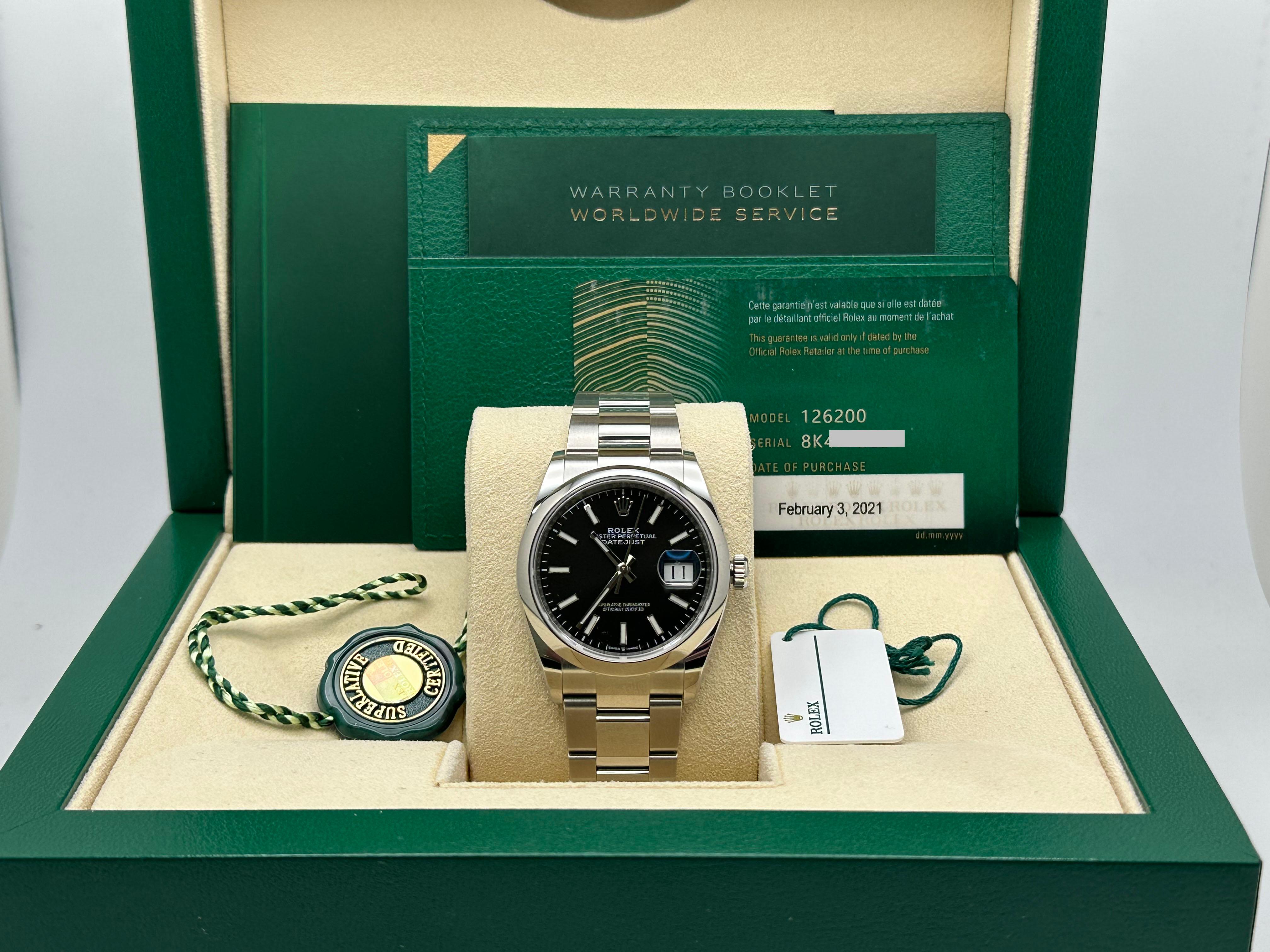 Rolex Datejust 126200 Black Dial Stainless Steel 36mm Box Paper 2021 In Excellent Condition For Sale In San Diego, CA