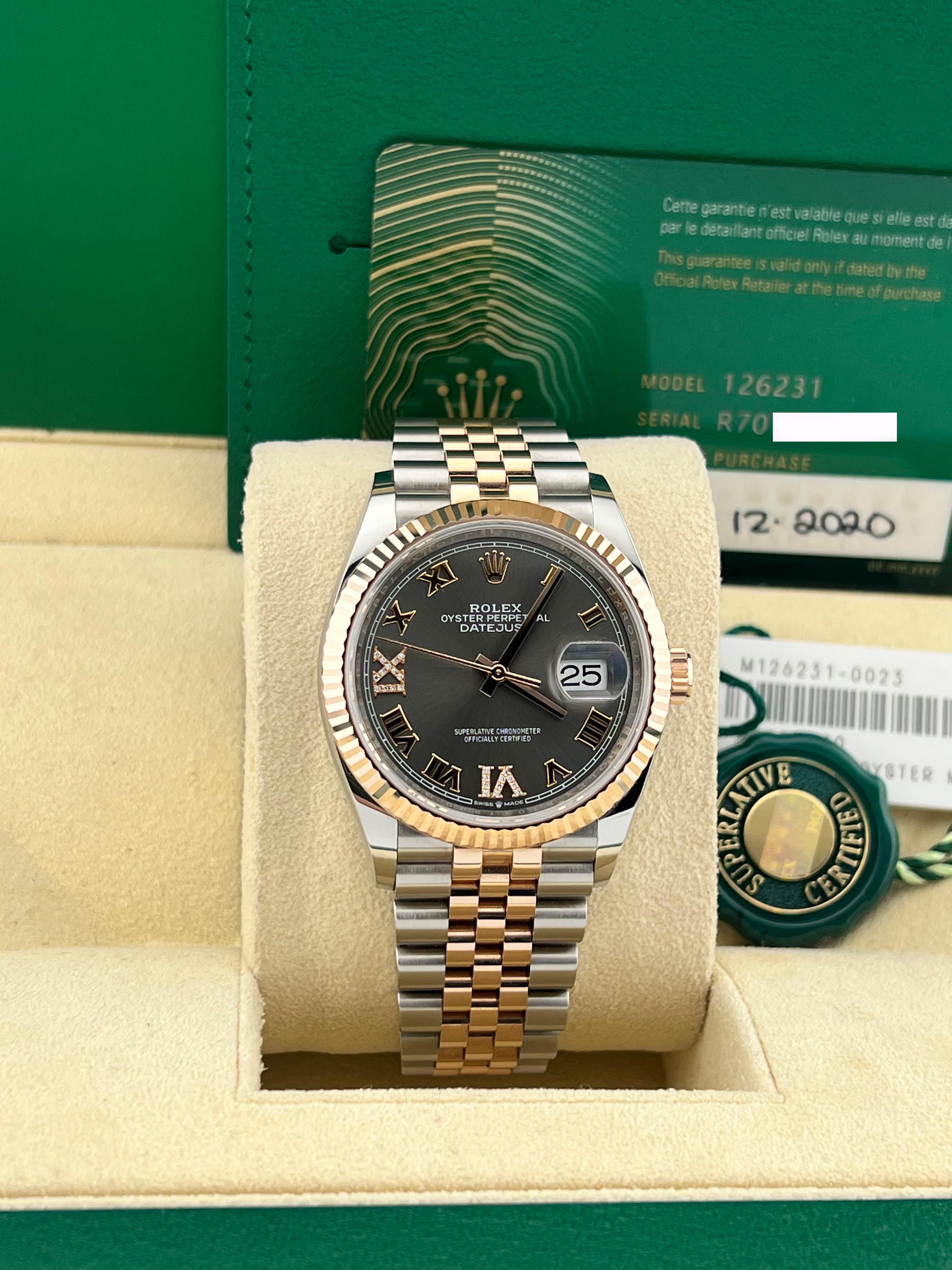 Style Number: 126231
Serial: R7077***
Year: 2020
Model: Rolex Datejust
Case Material: Stainless Steel 
Band: 18K Rose Gold & Stainless Steel
Bezel: 18K Rose Gold Fluted Bezel 
Dial: Slate Gray Dial with Diamond VI and IX
Face: Sapphire Crystal 
Case