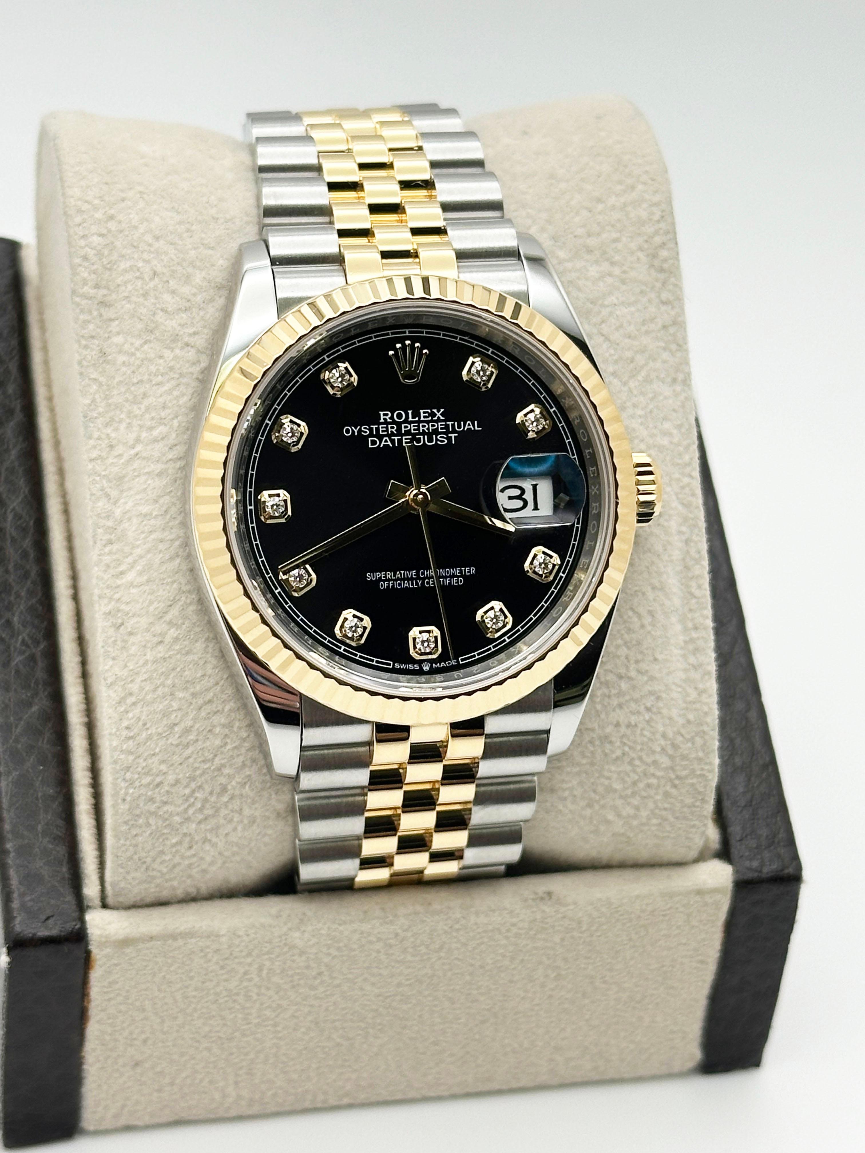 Style Number: 126233



Serial: 02U86***



Year: 2023

 

Model: Rolex Datejust 

 

Case Material: Stainless Steel 

 

Band: 18K Yellow Gold & Stainless Steel Jubilee Band 

  

Bezel: 18K Yellow Gold Fluted Bezel 

  

Dial: Original Factory