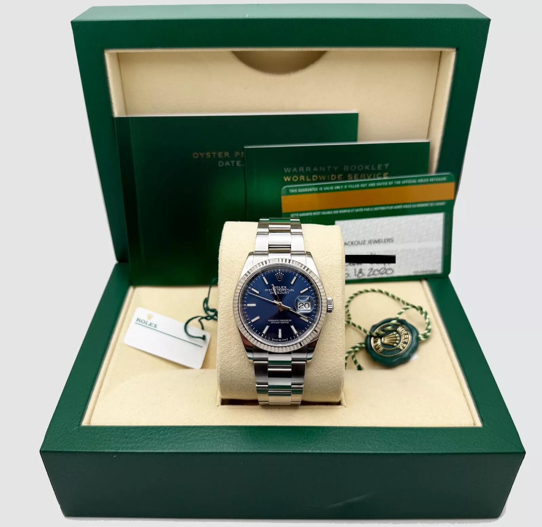 Style Number: 126234

Serial: 5434****

Year: 2020

Model: Rolex Datejust

Case Material: Stainless Steel

Band: Stainless Steel

Bezel: 18K White Gold Fluted Bezel 

Dial: Blue

Face: Sapphire Crystal

Case Size: 36mm

Includes:

-Rolex Box &
