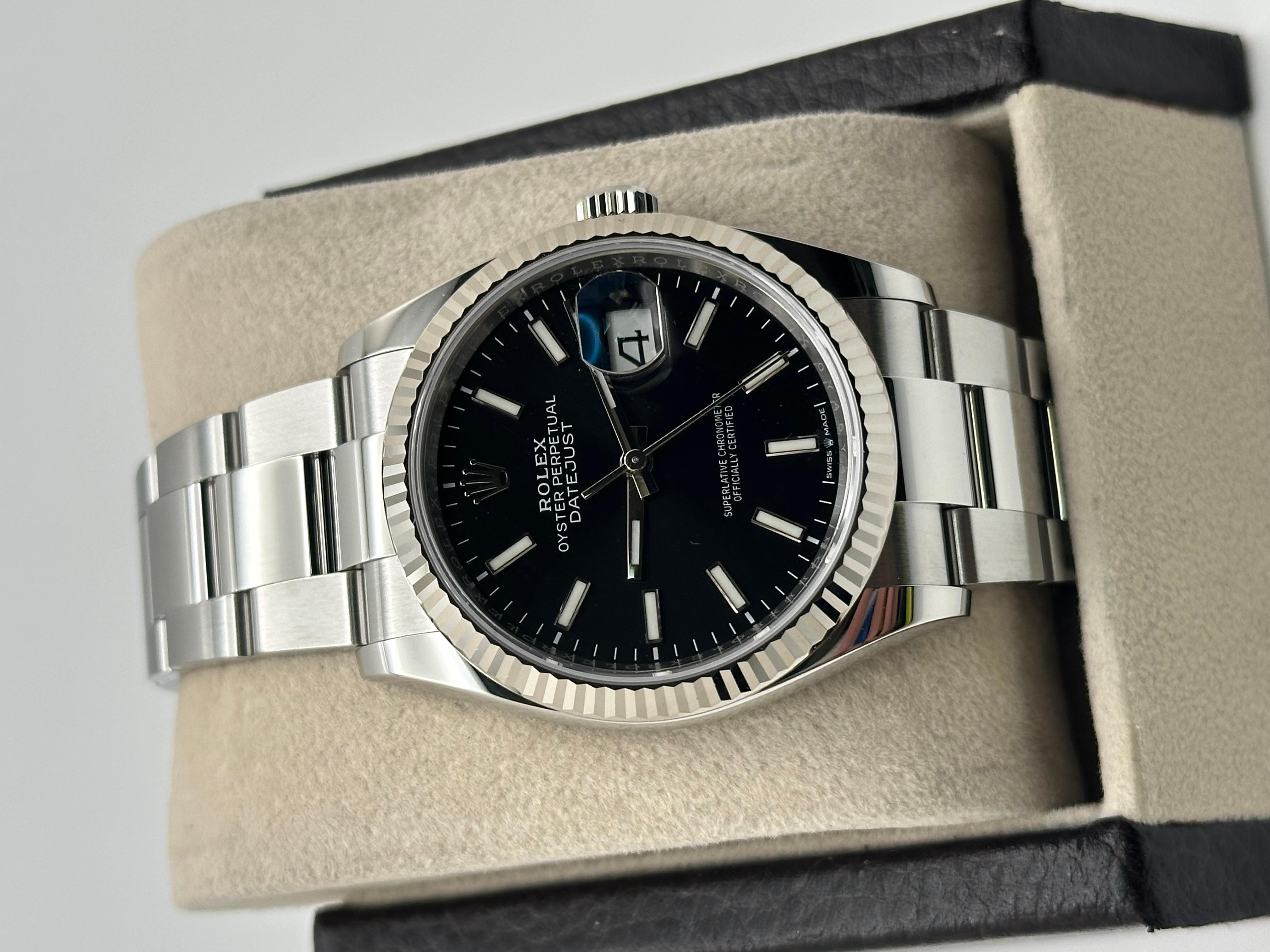 Style Number: 126234



Serial: 0Y45Y***



Year: 2020

 

Model: Rolex Datejust 

 

Case Material: Stainless Steel 

 

Band:  Stainless Steel 

  

Bezel: 18K White Gold Fluted Bezel 

  

Dial: Black Dial 

 

Face: Sapphire Crystal 

 

Case