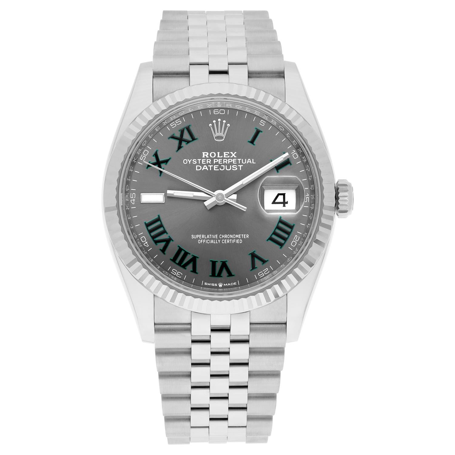 This Rolex Datejust wristwatch is a luxury timepiece with a round, 36mm stainless steel case and a Wimbledon dial featuring Roman numerals. The watch has a fluted, fixed 18K white gold bezel and is water-resistant up to 100 meters. The