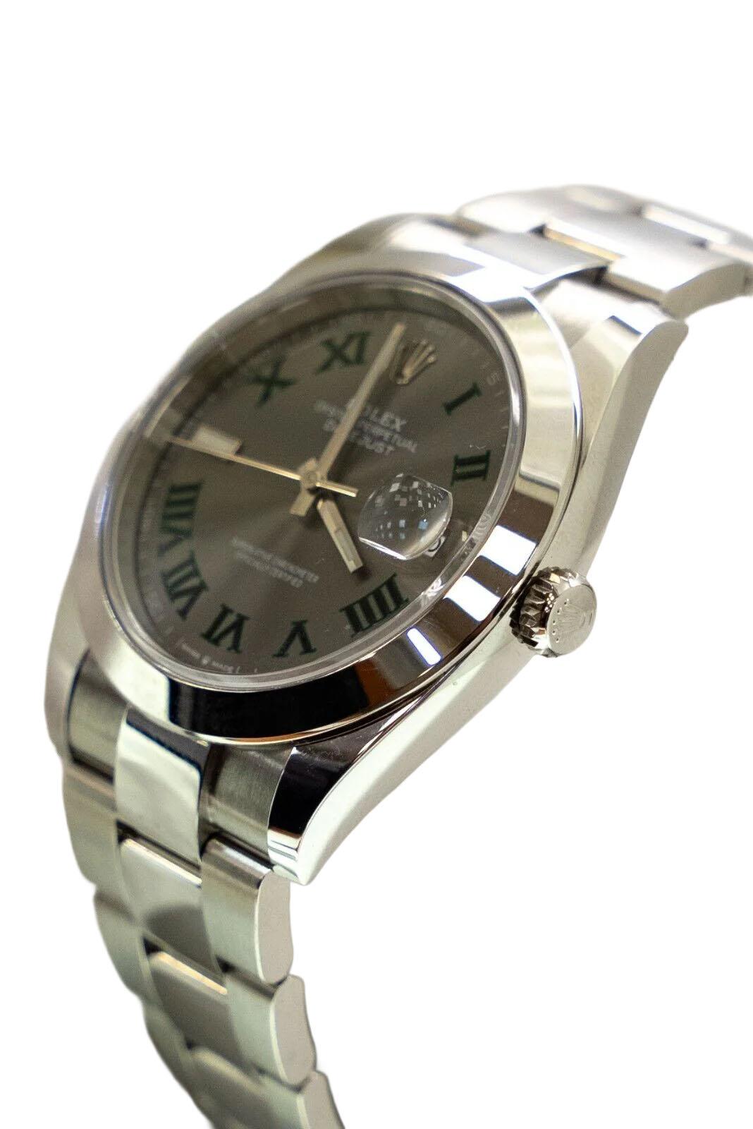 Entdecken Sie die raffinierte Eleganz der Rolex Datejust 126300 Wimbledon 41mm Herrenuhr, ein Modell aus dem Jahr 2023, das zeitloses Design und moderne Raffinesse perfekt miteinander verbindet. Dieser außergewöhnliche Zeitmesser verfügt über das