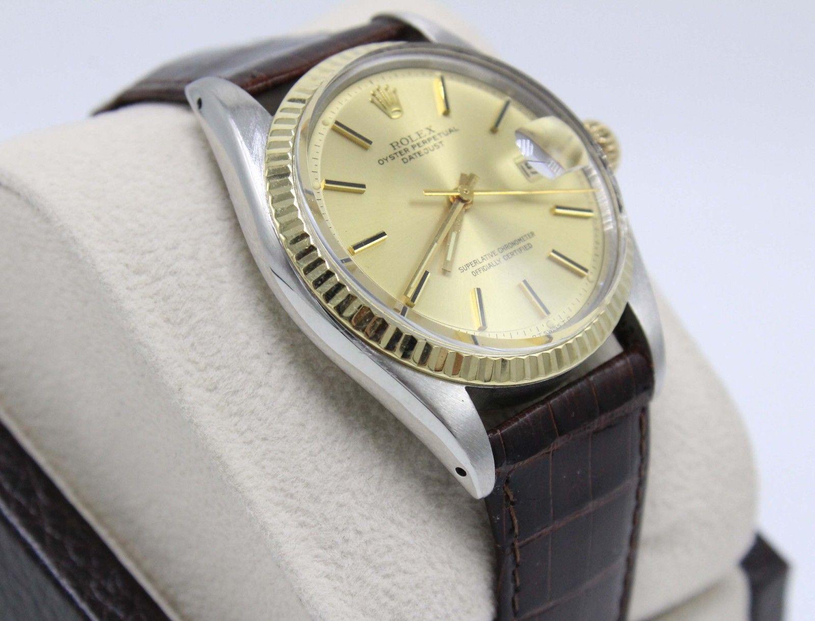Style Number: 1601

Serial: 3761***

Model: Datejust 

Case Material: Stainless Steel

Band: Brown Leather

Bezel: 14K Yellow Gold

Dial: Champagne

Face: Acrylic 

Case Size: 36mm

Includes: 

-Elegant Watch Box

-Certified Appraisal 

-6 Month