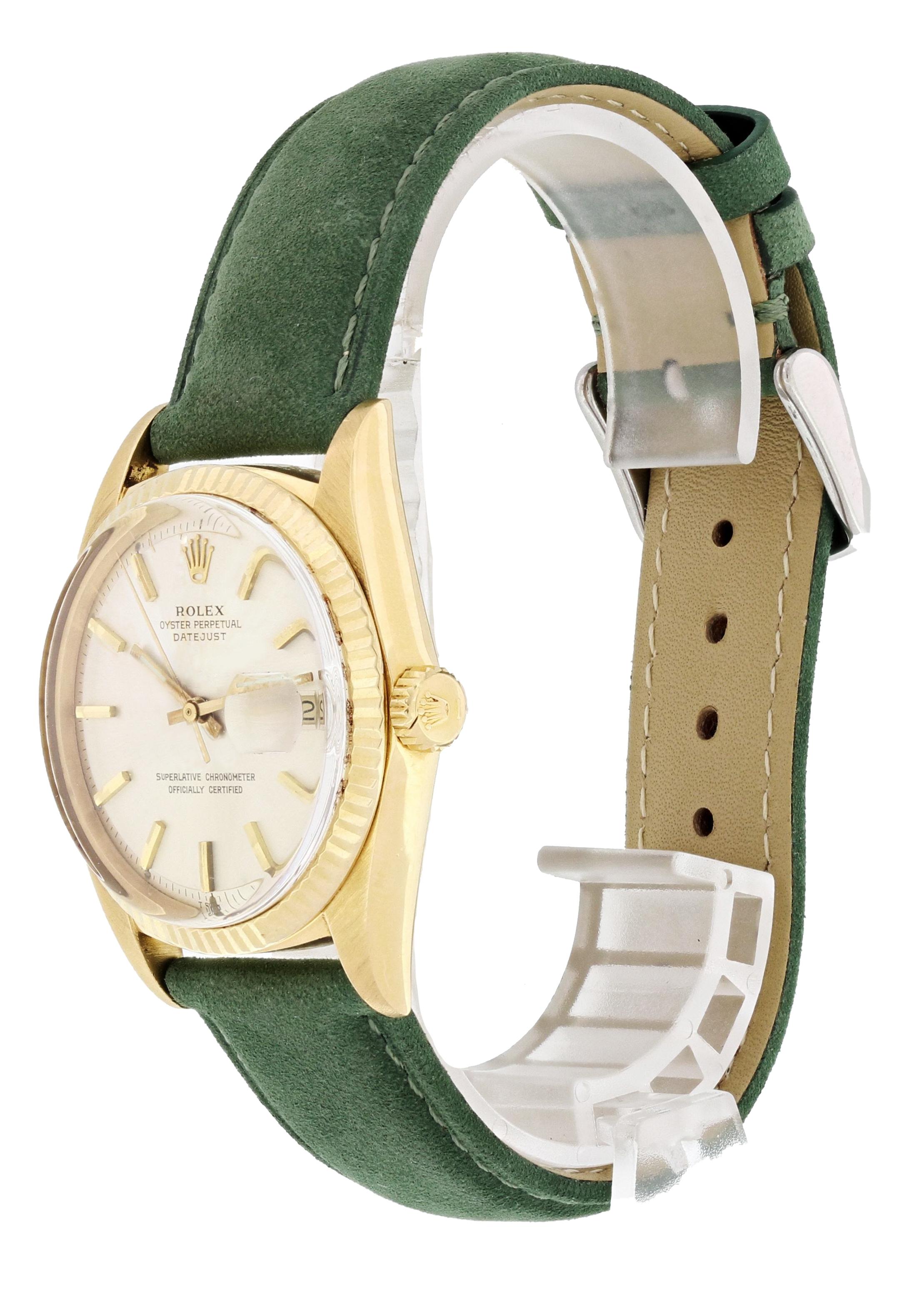 Rolex Oyster Perpetual Datejust 1601 Mens Watch. 36mm 18k yellow gold case with a fluted bezel. Champagne dial with gold hands and index hour markers. Minute markers around the outer dial. Date display at the 3 o'clock position. Green suede leather