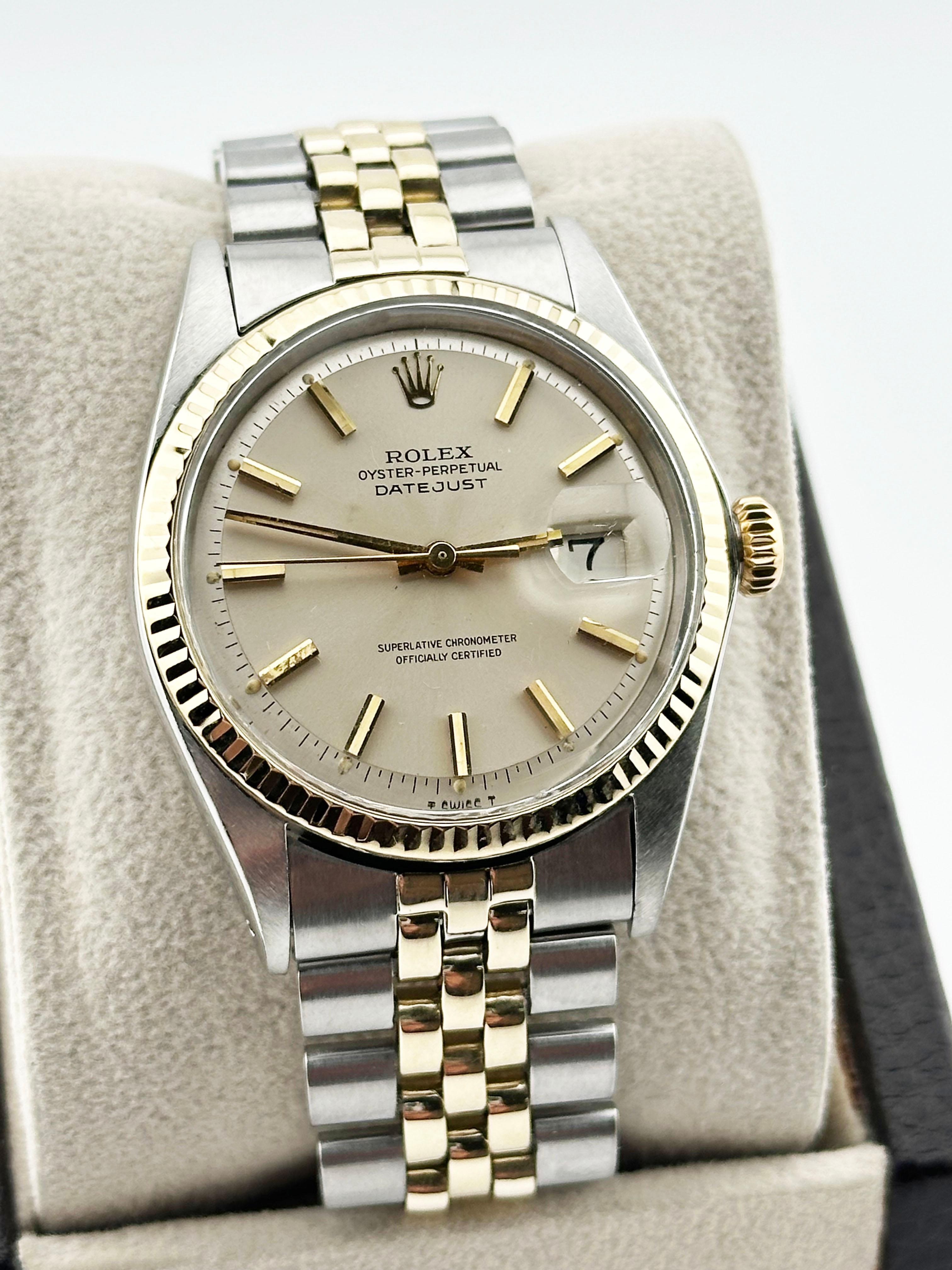 Style Number: 1601

Serial: 2222***

Year: 1969

Model: Rolex Datejust

Case Material: Stainless Steel 

Band: 14K Yellow Gold & Stainless Steel 

Bezel: 14K Yellow Gold 

Dial: Silver Pie Pan Dial 

Face: Acrylic

Case Size: 36mm