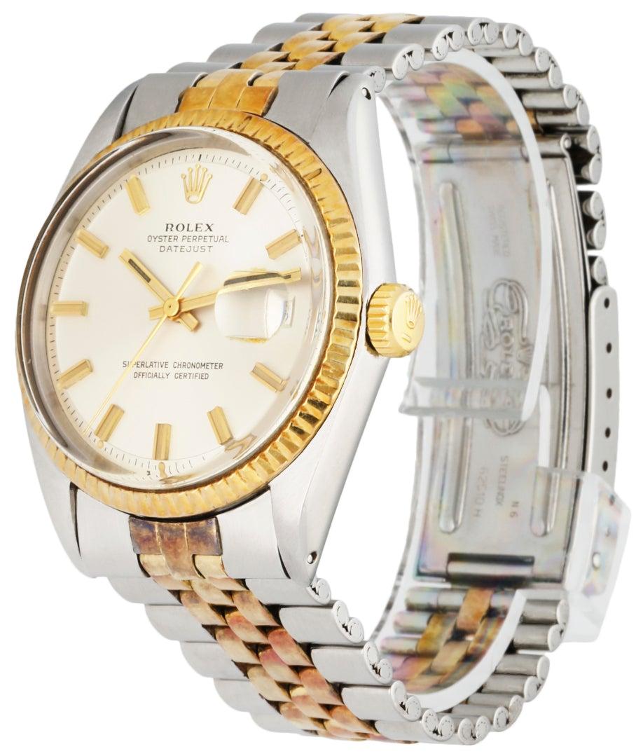 
Rolex Datejust 1601 Men's Watch. 36mm Stainless Steel case. 18k Yellow Gold fluted bezel. Silver dial with gold hands and index hour markers. Minute markers on the outer dial. Date display at the 3 o'clock position. Stainless Steel & 18k yellow
