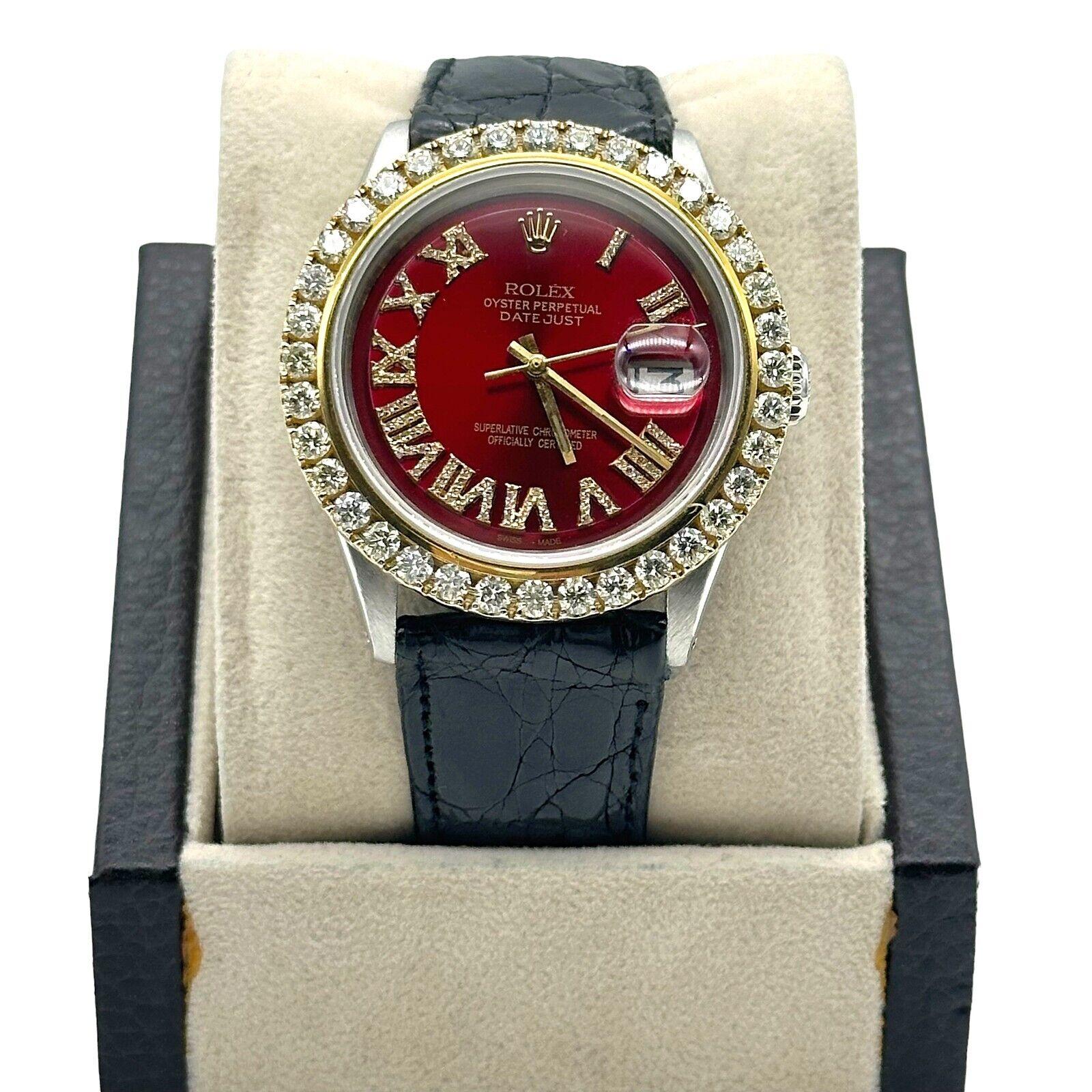 Style Number: 1601

Serial: 928***

Model: Datejust

Case Material: Stainless Steel

Band: Black Leather Strap

Bezel: 18K Gold Custom Diamond Bezel - Approx 3.50ctw

Dial: Red Refinished Roman Diamond Dial

Face: Sapphire Crystal

Case Size: