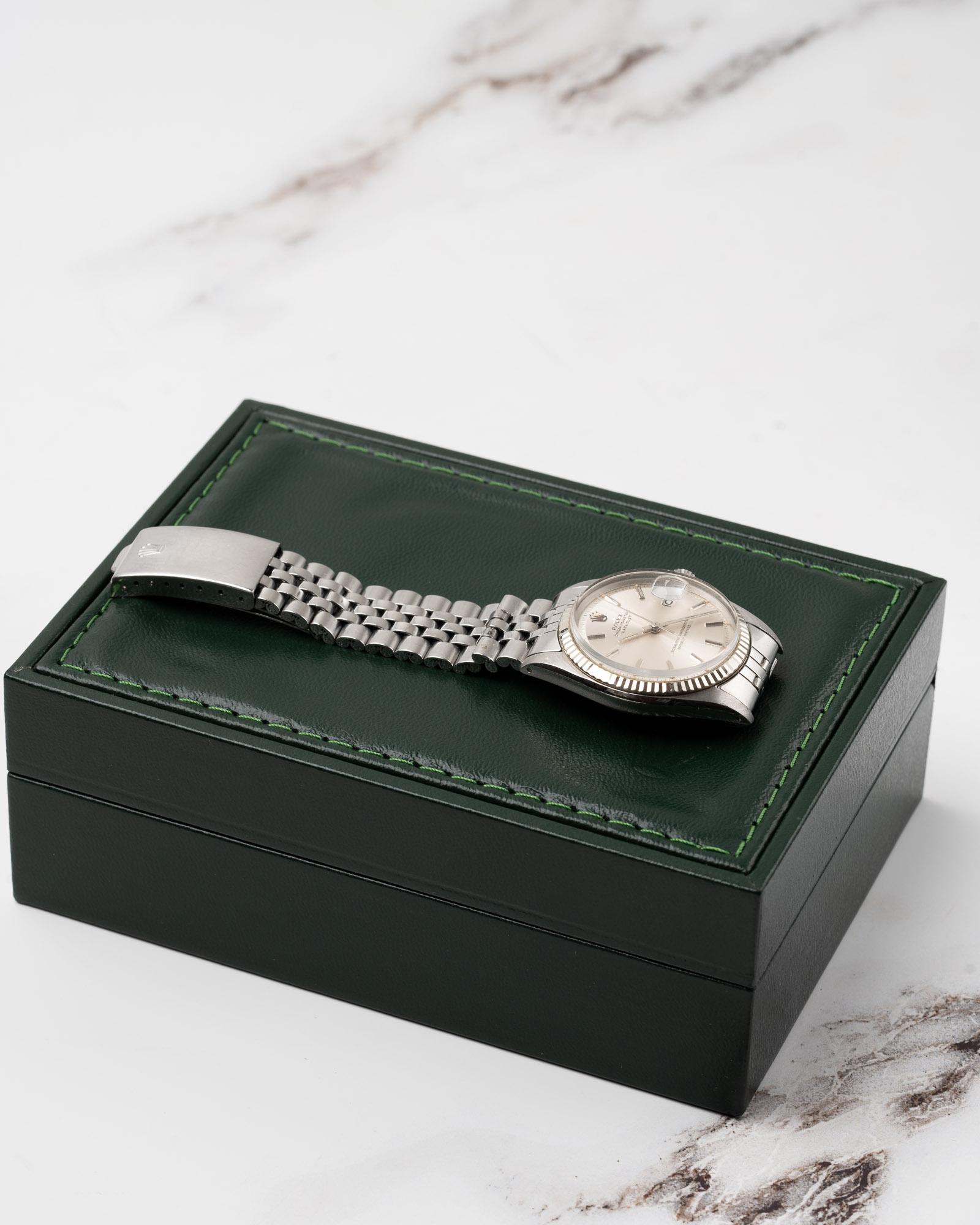 Rolex Datejust 1601 Silver Piepan Dial 18k WG Fluted Bezel 1973

SKU	1906
Brand	Rolex
Model	Datejust
Reference	1601
Year	1973
Dial	Silver Piepan Dial  
Case	Steel and 18k White Gold Fluted Bezel