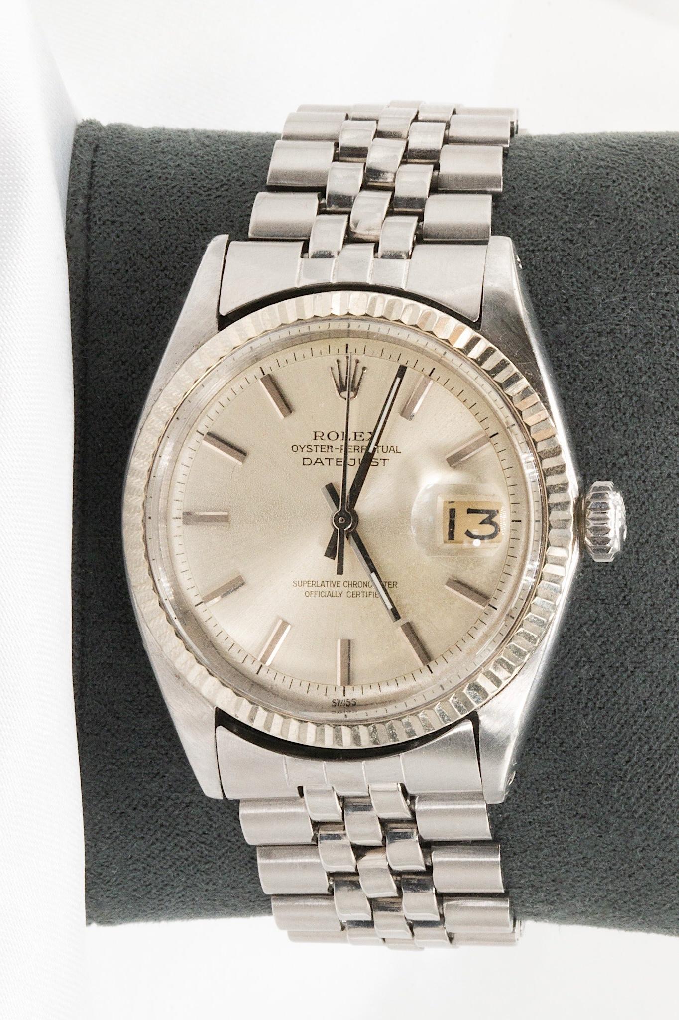 This 1963 Rolex Oyster Datejust (Reference 1601) is a true classic, celebrated as one of Rolex’s most iconic models. Its vintage charm is paired with tasteful modern upgrades:  

Strap: Features Rolex Jubilee Bracelet 
Crystal: Original acrylic