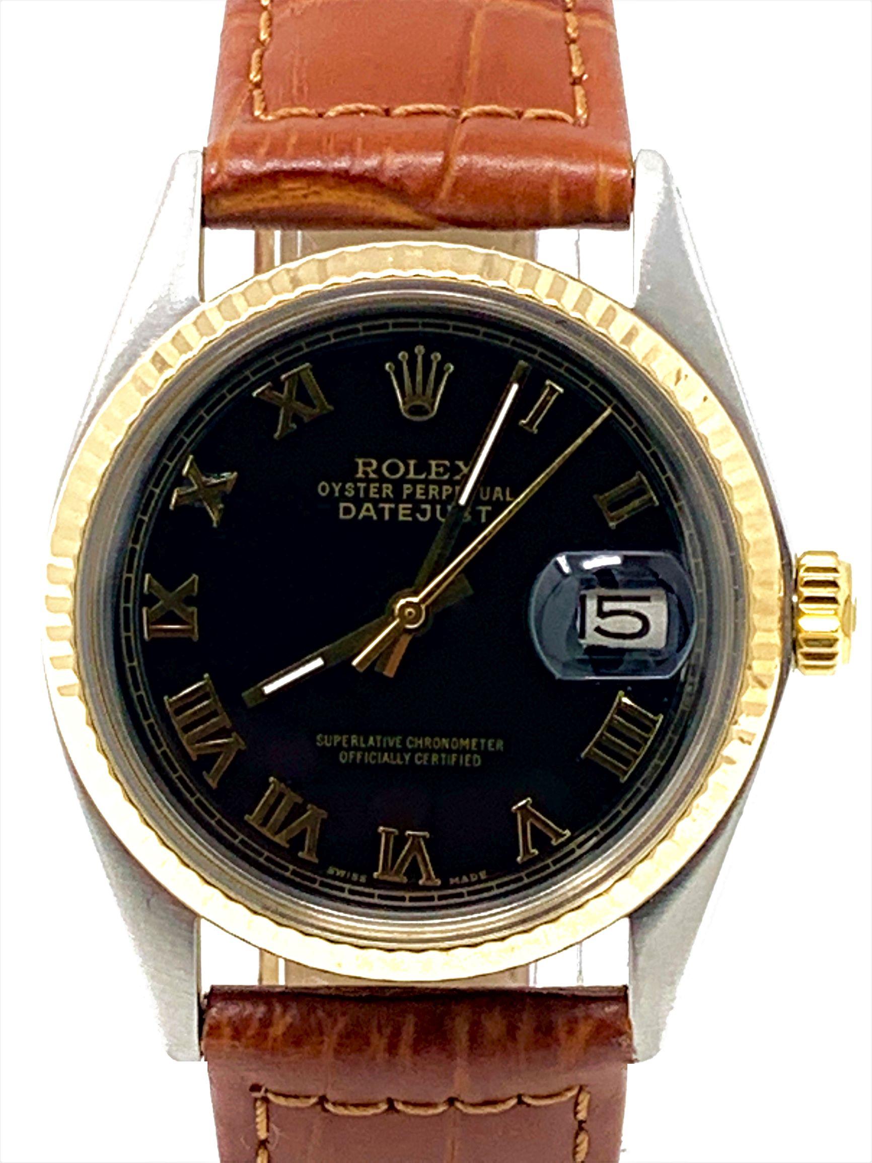 Brand - Rolex
Model - 1601 Datejust 
Case Size - 36mm
Metals - Steel/Yellow Gold
Dial - Two-tone Roman Numeral 
Bezel - Rolex gold Fluted 
Crystal - New Acrylic
Movement - Rolex Cal.1570 Automatic
Wrist Band - Generic Brown Leather 
Wrist Size - 8