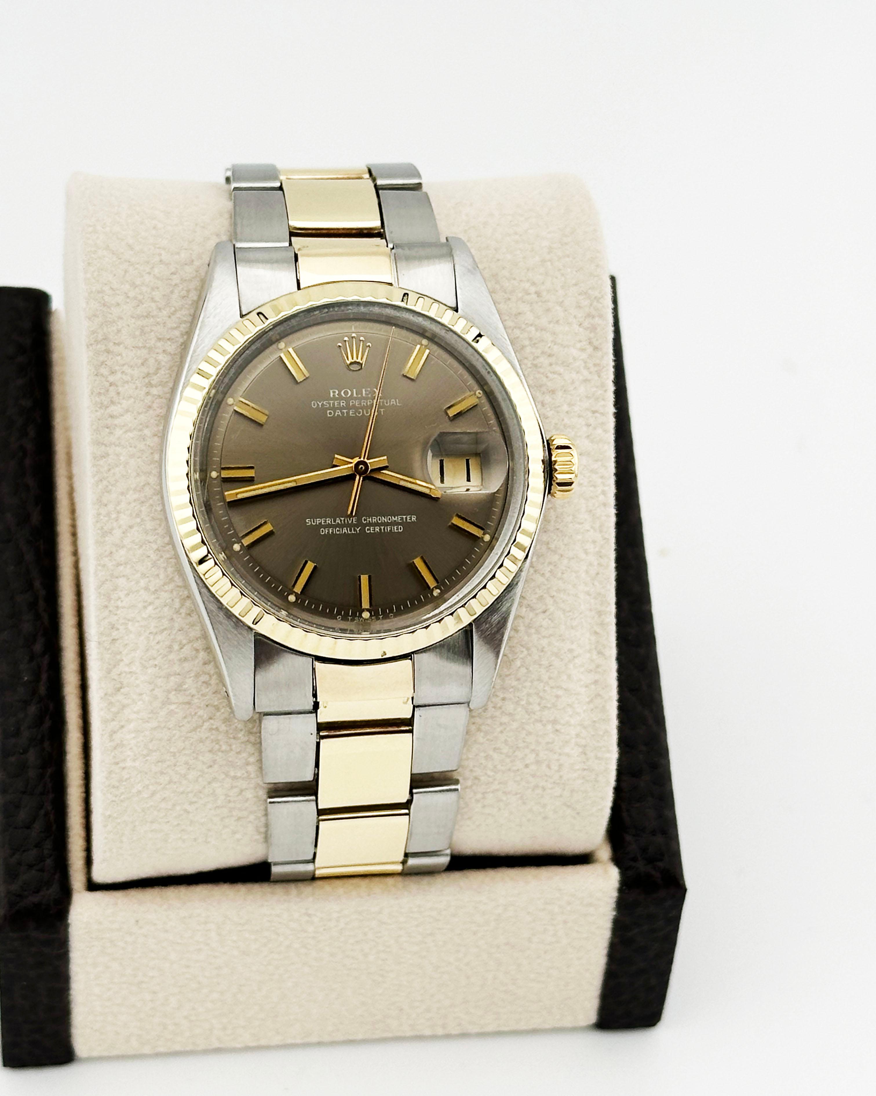 Style Number: 1601


Serial: 3604***


Year: 1979


Model: Rolex Datejust 


Case Material: Stainless Steel 


Band: 14K Yellow Gold & Stainless Steel 


Bezel: 14K Yellow Gold 


Dial: Bronze Pie Pan Dial 


Face: Acrylic


Case Size: 36mm
