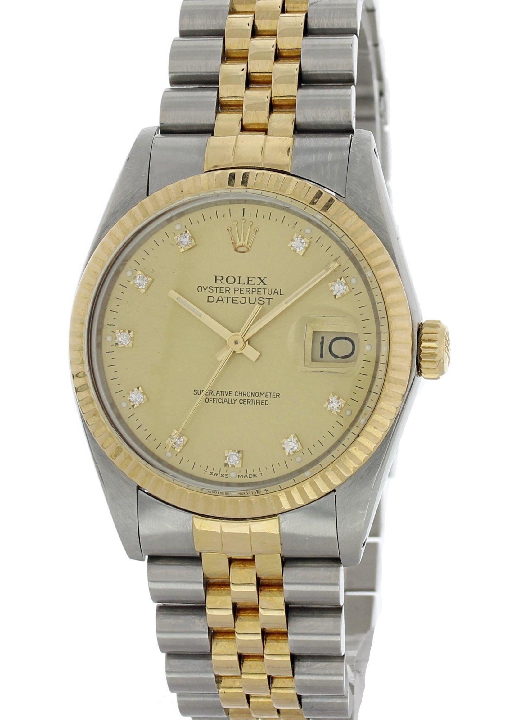 Rolex Oyster Perpetual Datejust 16013 Mens Watch. Stainless steel 36mm case with an 18k yellow gold fluted bezel. Champagne dial with gold hands and factory placed diamond hour markers. Quickset date display. Two-tone jubilee bracelet with stainless