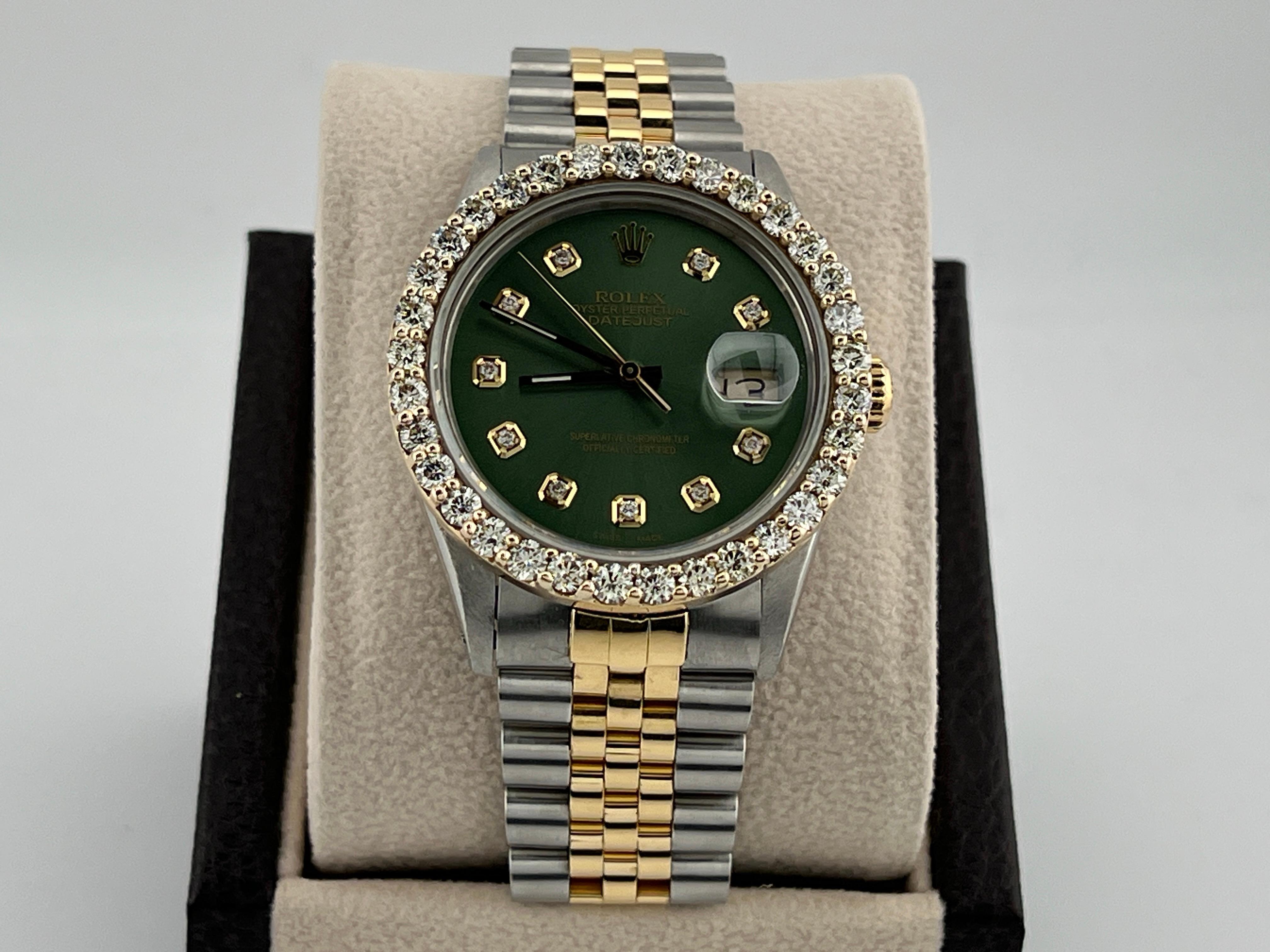 Style Number: 16013



Serial: 9492***



Year: 1987

 

Model: Rolex Datejust 

 

Case Material: Stainless Steel 

 

Band: 18K Yellow Gold & Stainless Steel 

  

Bezel: Custom Diamond Bezel 

  

Dial: Custom Green Diamond Dial 

 

Face: