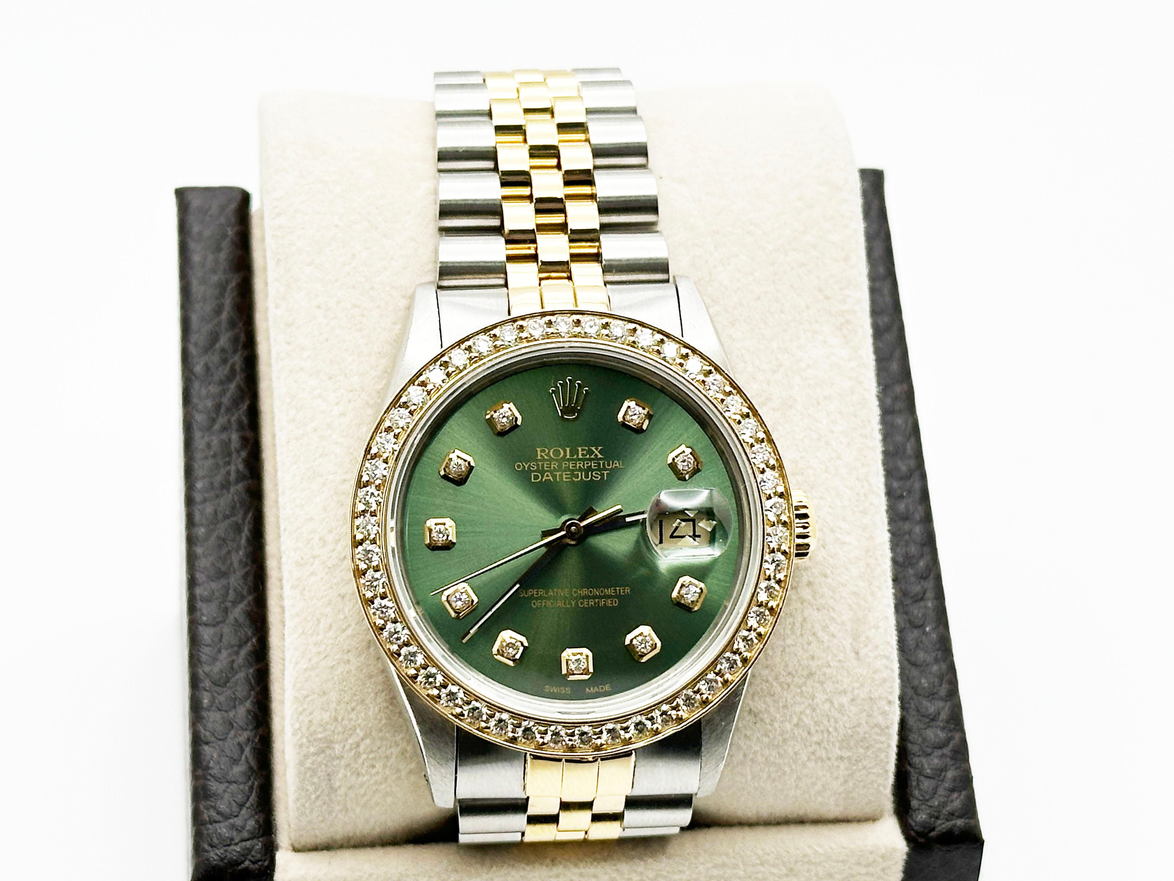 Style Number: 16013



Serial: 9492***



Year: 1987

 

Model: Rolex Datejust 

 

Case Material: Stainless Steel 

 

Band: 18K Yellow Gold & Stainless Steel 

  

Bezel: Custom Diamond Bezel 

  

Dial: Custom Green Diamond Dial 

 

Face: