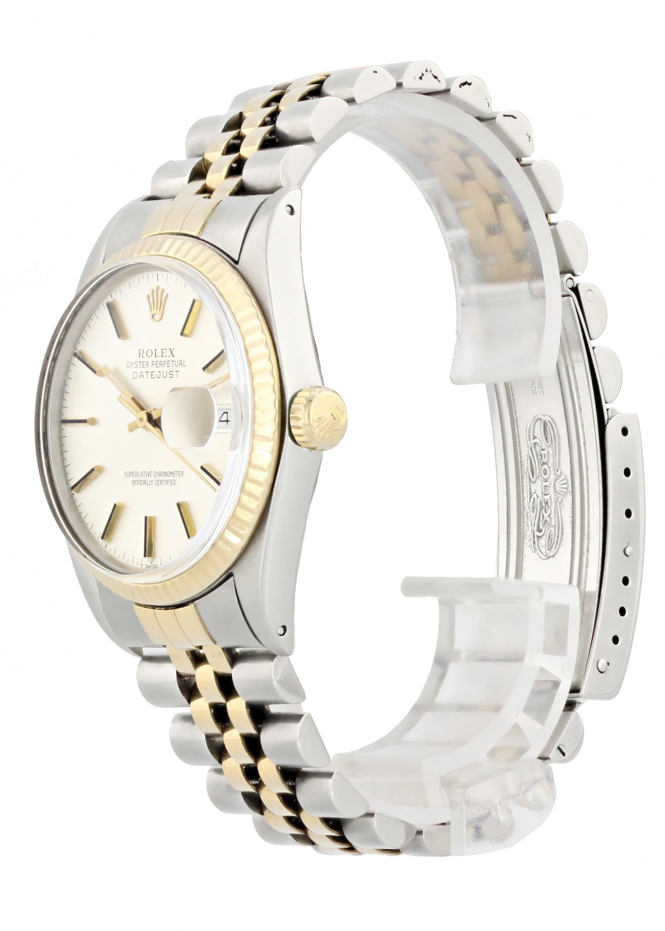 Rolex Datejust 16013 Men Watch. 
36mm Stainless Steel case. 
Yellow Gold Stationary bezel. 
Silver dial with Luminous gold hands and index hour markers. 
Minute markers on the outer dial. 
Date display at the 3 o'clock position. 
Two Tone Stainless
