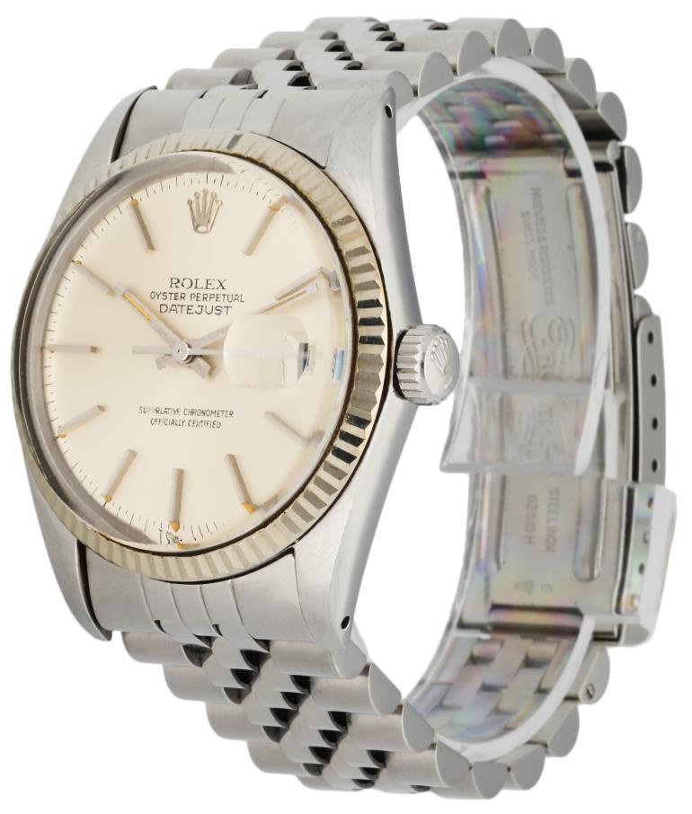 Rolex Datejust Professional 16014 Men's Watch. 36mm Stainless Steel case.18K White Gold fluted bezel. Silver dial with Steel hands and index hour markers.Minute markers on the outer dial. Date display at the 3 o'clock position. Stainless Steel