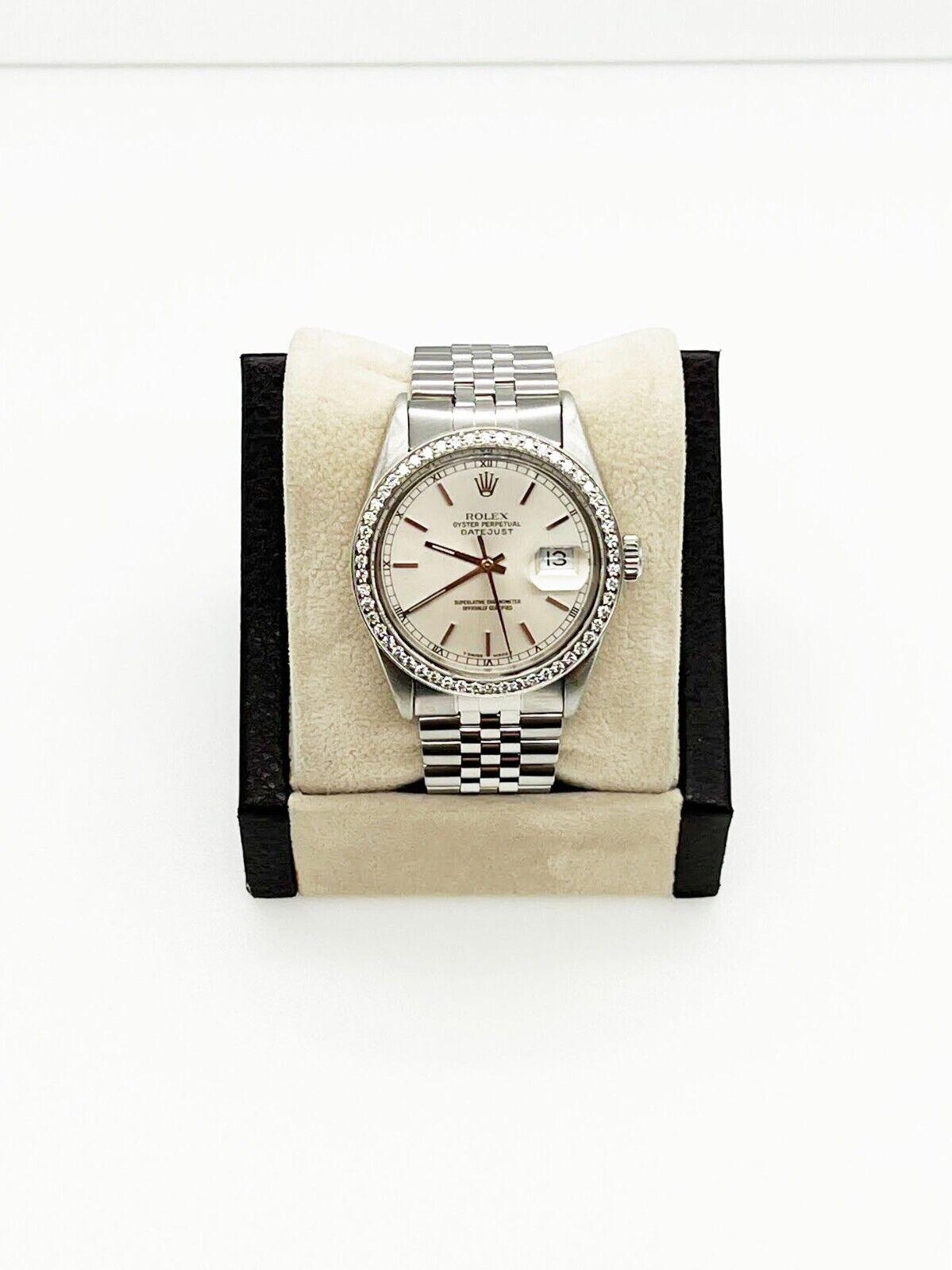 Style Number: 16014

 
Serial: 5591***

Year: 1978

Model: Datejust 

Case Material: Stainless Steel 

Band: Stainless Steel 

Bezel: Custom Diamond Bezel 

Dial: Silver

Face: Sapphire Crystal 

Case Size: 36mm 

Includes: 

-Elegant Watch
