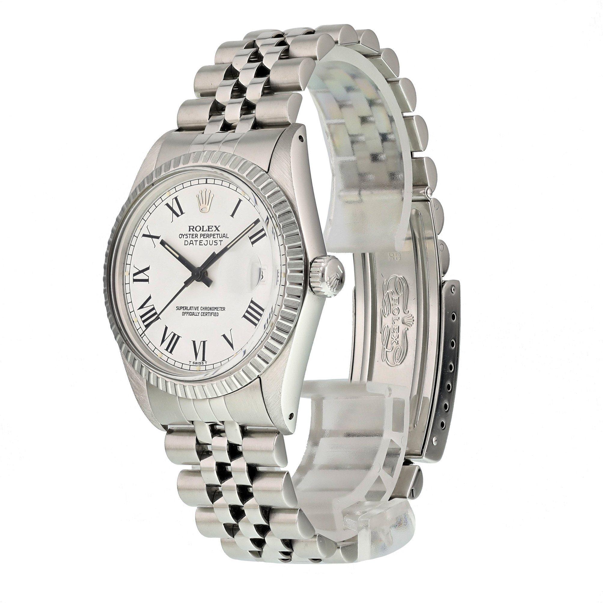 Rolex Datejust 16030 Buckley Dial Men's Watch
36mm Stainless Steel case. 
Stainless Steel engine turn bezel. 
White dial with steel hands and Roman numeral hour markers. 
Minute markers on the outer dial. 
Stainless Steel Bracelet with Fold Over