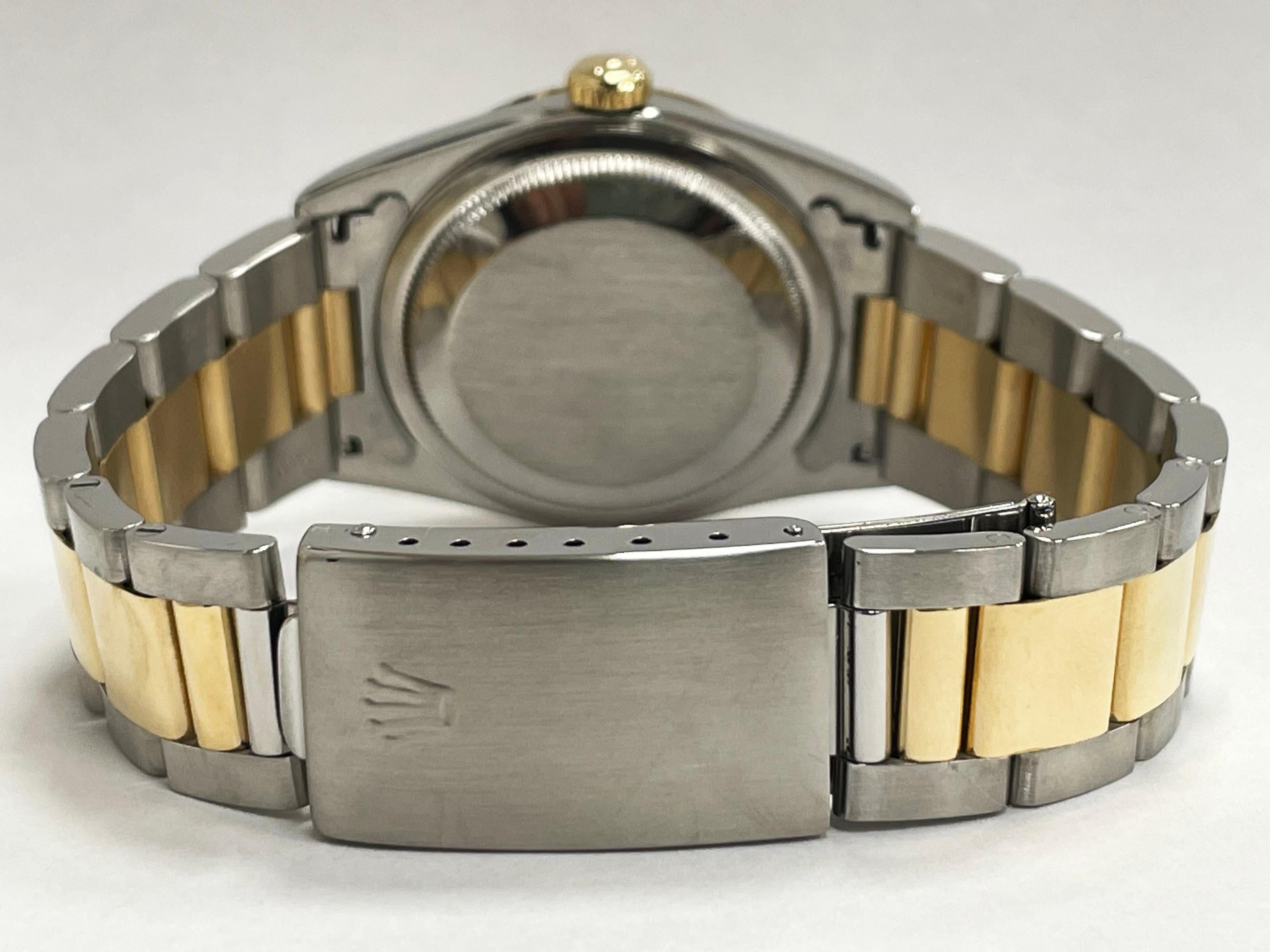 Style Number: 16203
Serial: T475**
Model: Datejust
Case Material: Stainless Steel & 18k Yellow Gold
Band: 18K Yellow Gold & Stainless Steel 
Bezel:  18K Yellow Gold
Dial: Champagne Tapestry Dial
Face: Sapphire Crystal 
Case Size: 36mm
Includes: