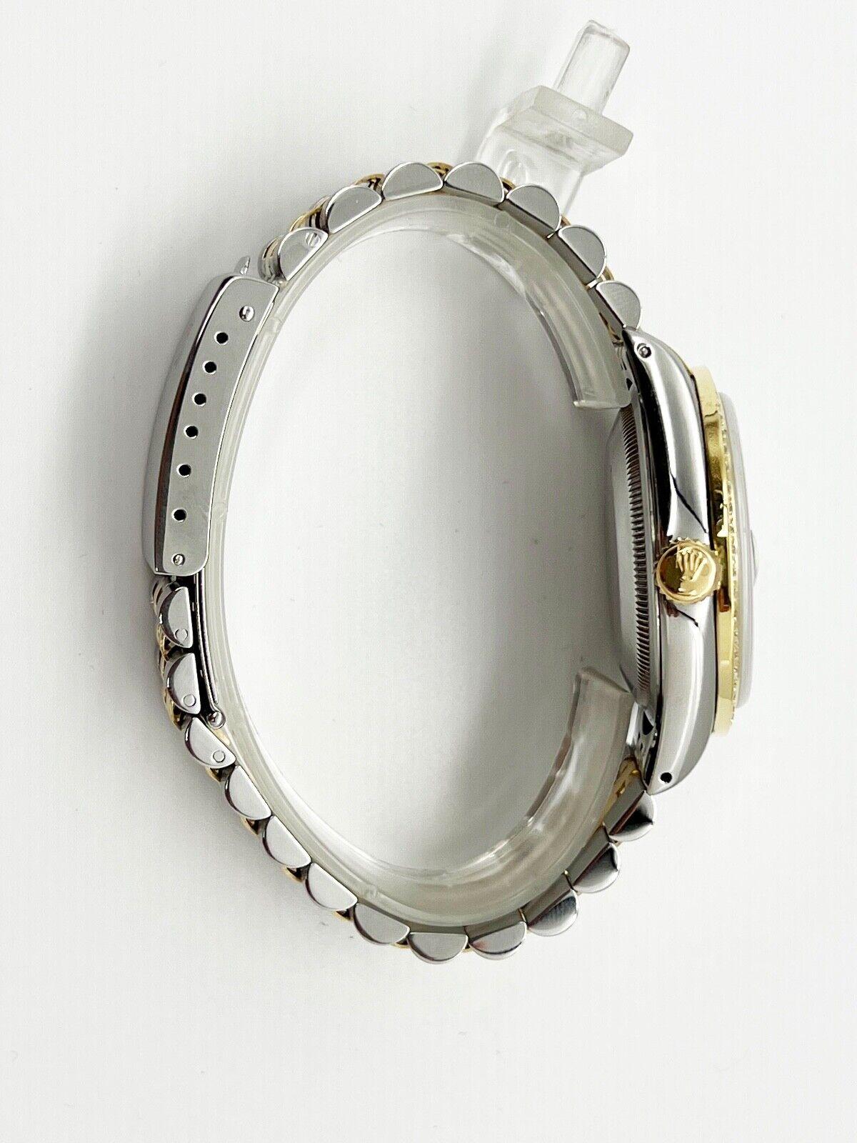 Style Number: 16233



Serial: X302***



Year: 1991

 

Model: Datejust

 

Case Material: Stainless Steel

 

Band: 18K Yellow Gold & Stainless Steel

 

Bezel: Custom Diamond Bezel

 

Dial: Custom Black Roman Dial

 

Face: Sapphire Crystal

