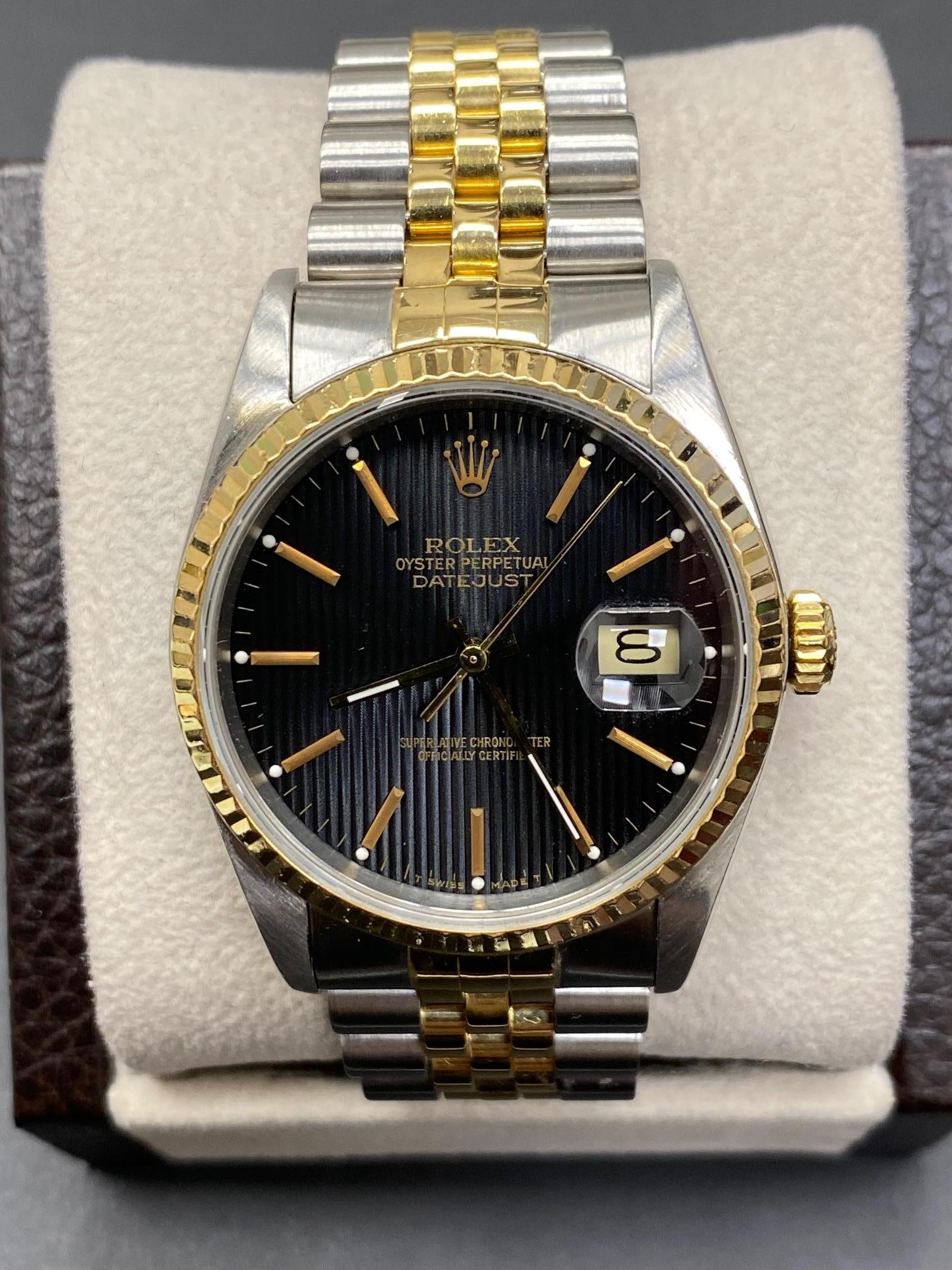 Style Number: 16233

 

Serial: L496***

 

Model: Datejust

 

Case Material: Stainless Steel

 

Band: 18K Yellow Gold & Stainless Steel

 

Bezel:  18K Yellow Gold

 

Dial: Black 

 

Face: Sapphire Crystal 

 

Case Size: 36mm

 

Includes: