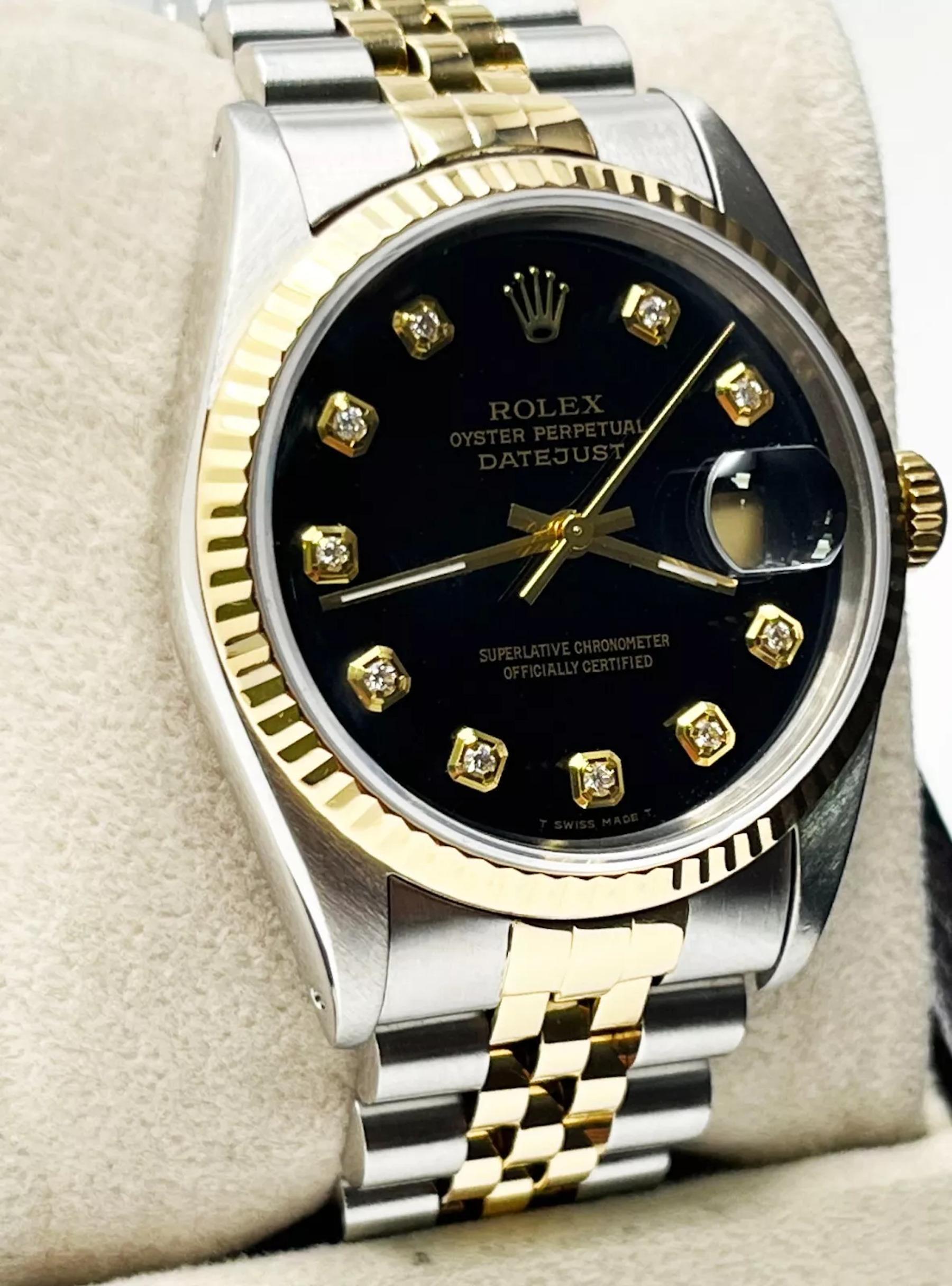 Style Number: 16233
Serial: X993***
Year: 1991
Model: Datejust
Case Material: Stainless Steel
Band: 18K Yellow Gold & Stainless Steel
Bezel: 18K Yellow Gold
Dial: Custom Black Diamond Dial
Face: Sapphire Crystal
Case Size: 36mm

 
Includes: